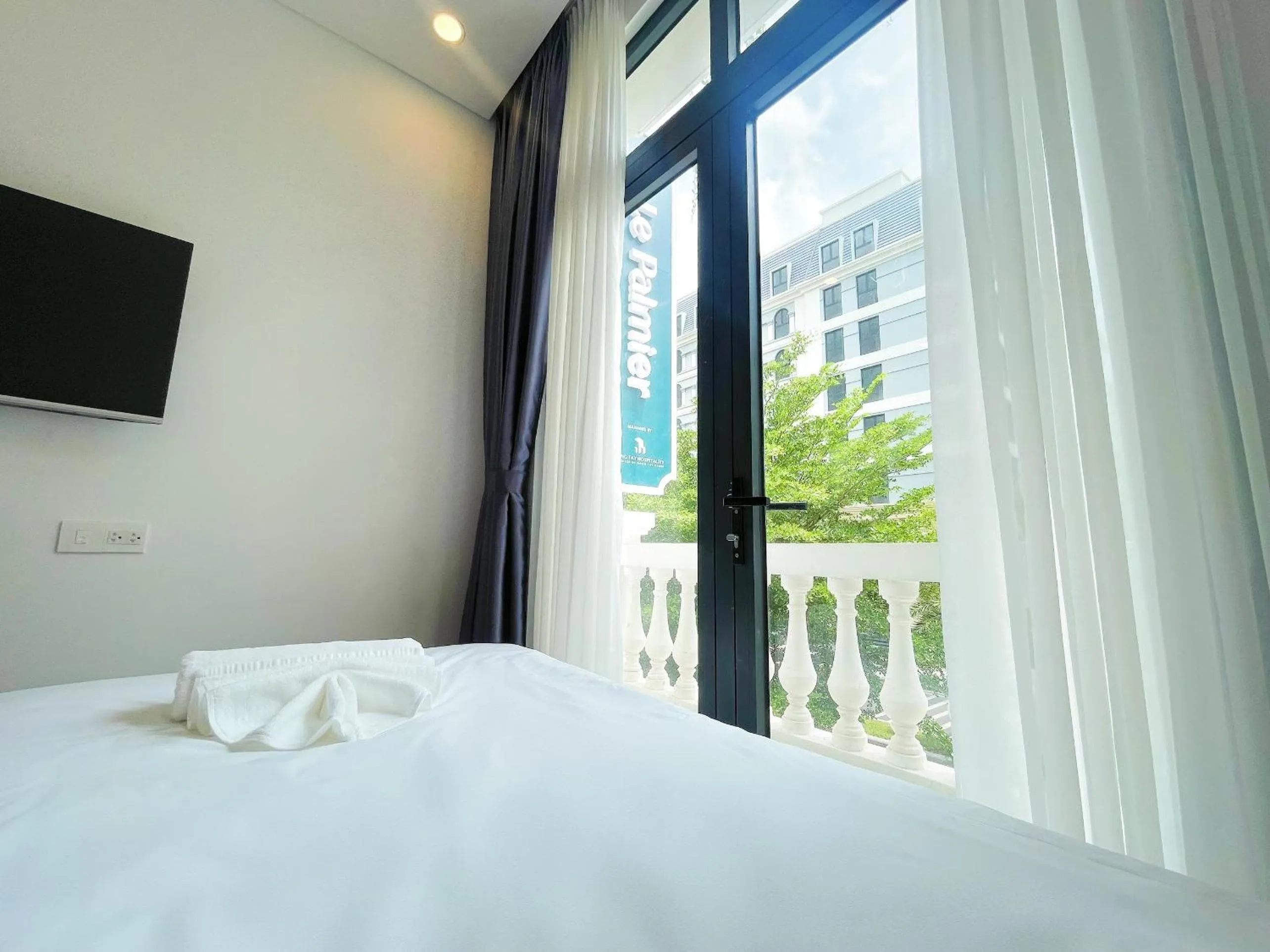 Balcony/Terrace, Bed in Le Palmier Phu Quoc Hotel - Free Shuttle To Grand World