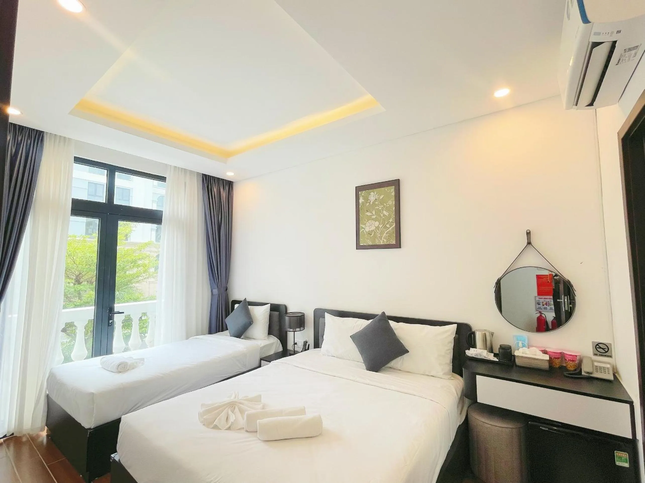 Photo of the whole room, Bed in Le Palmier Phu Quoc Hotel - Free Shuttle To Grand World