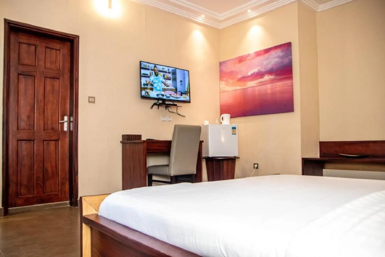 Property building, Bed in Hôtel Guest House Quatre Saisons