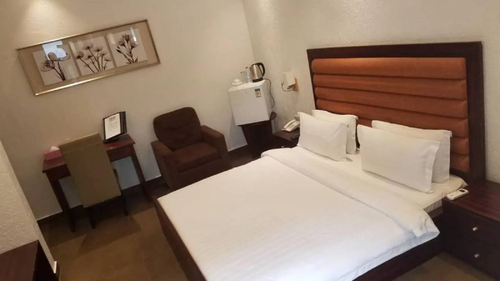 Bed in Hôtel Guest House Quatre Saisons