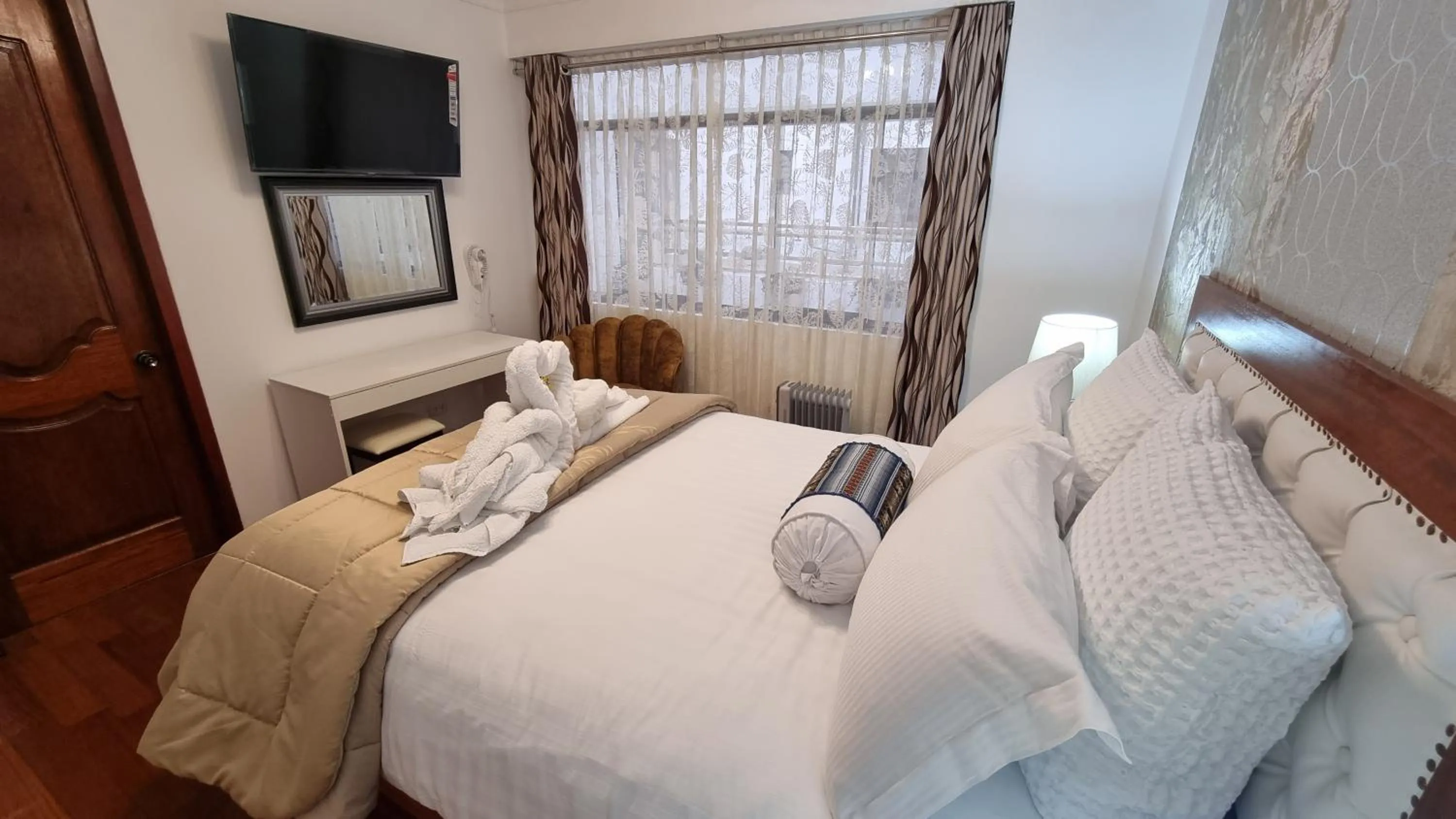 Bed in Hotel-Apartment INKASABIOS