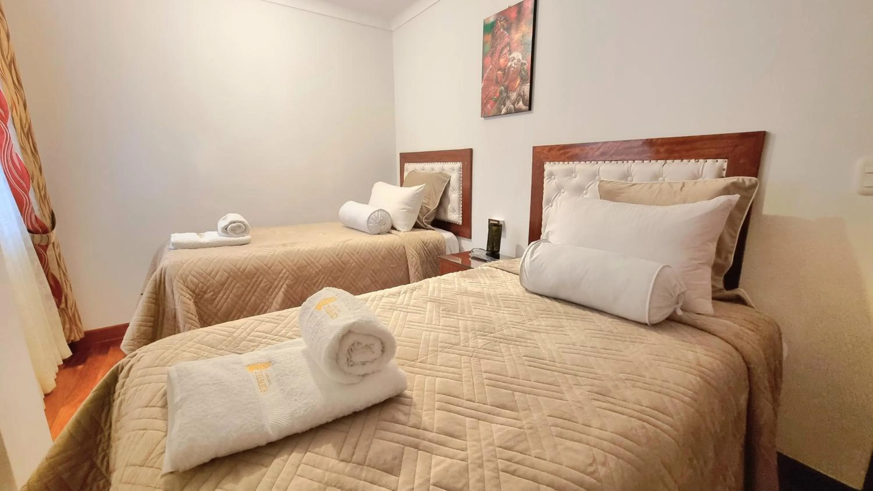 Bed in Hotel-Apartment INKASABIOS