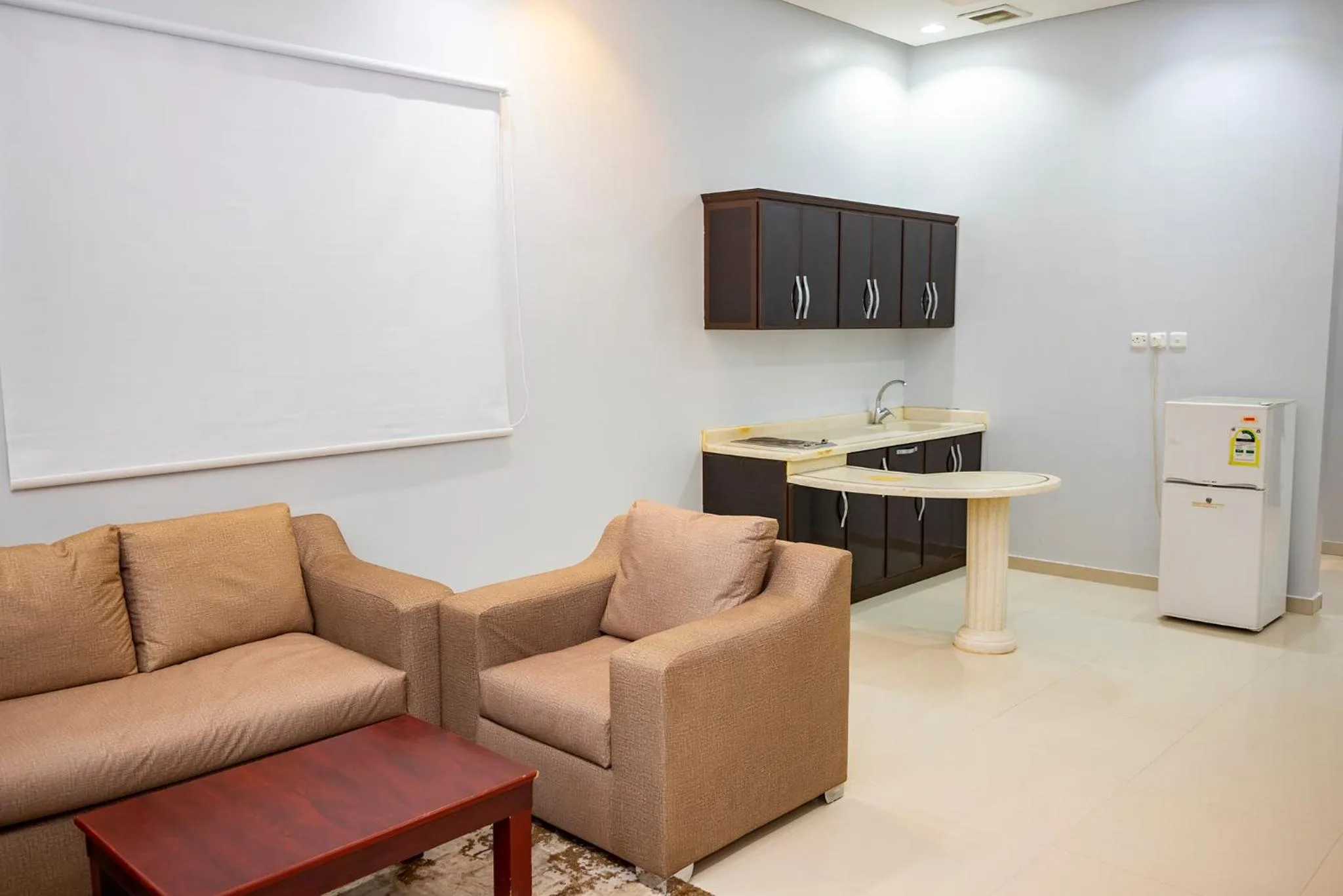 Kitchen or kitchenette in شقق اهلين اربعة للشقق المخدومة