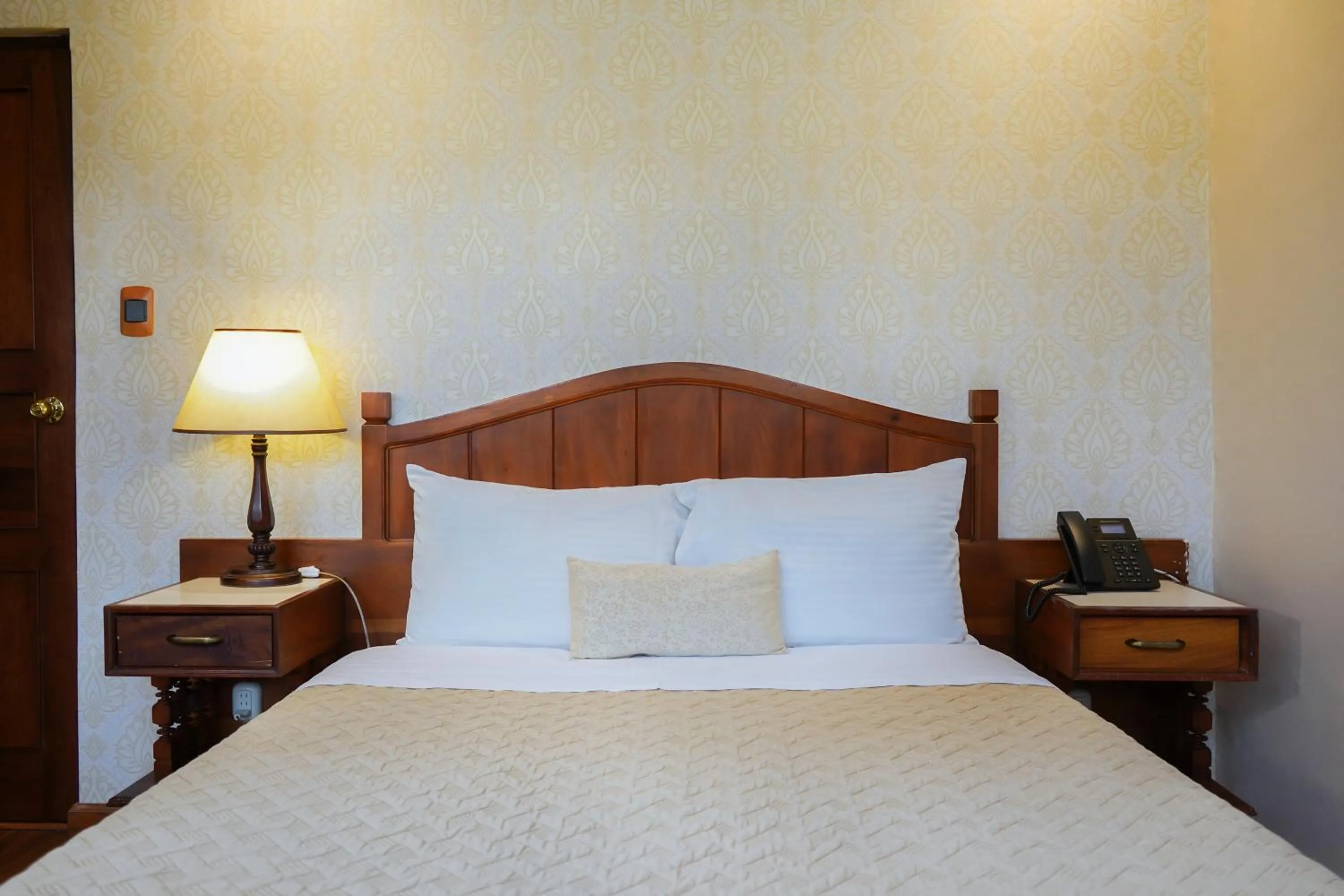 Bed in Uzhupud Garden Hotel & Lodge