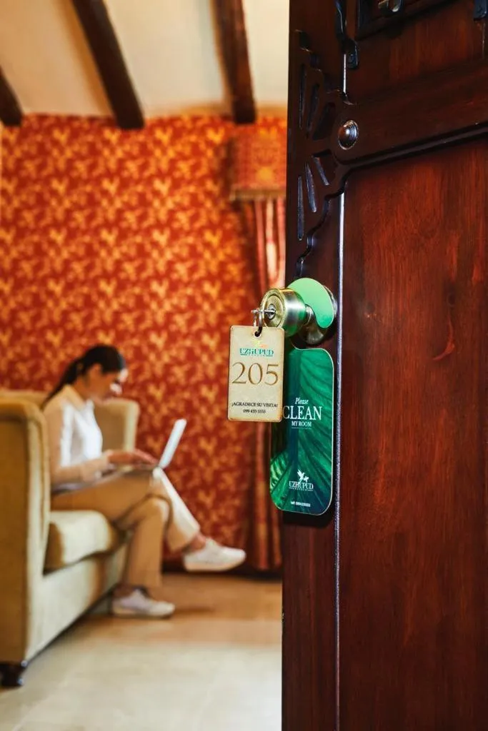 Property building in Uzhupud Garden Hotel & Lodge