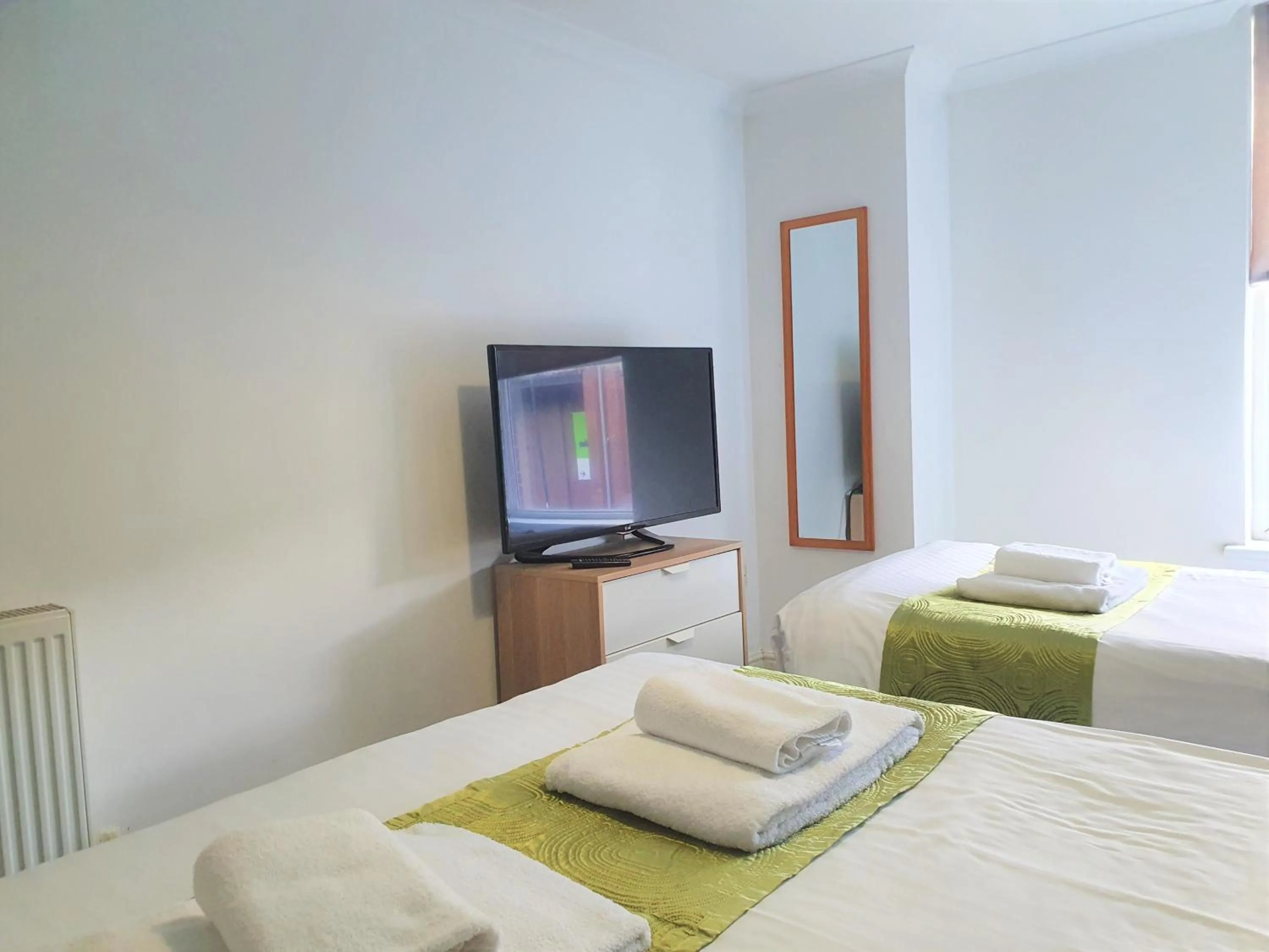 Bed in Old Town Apartments