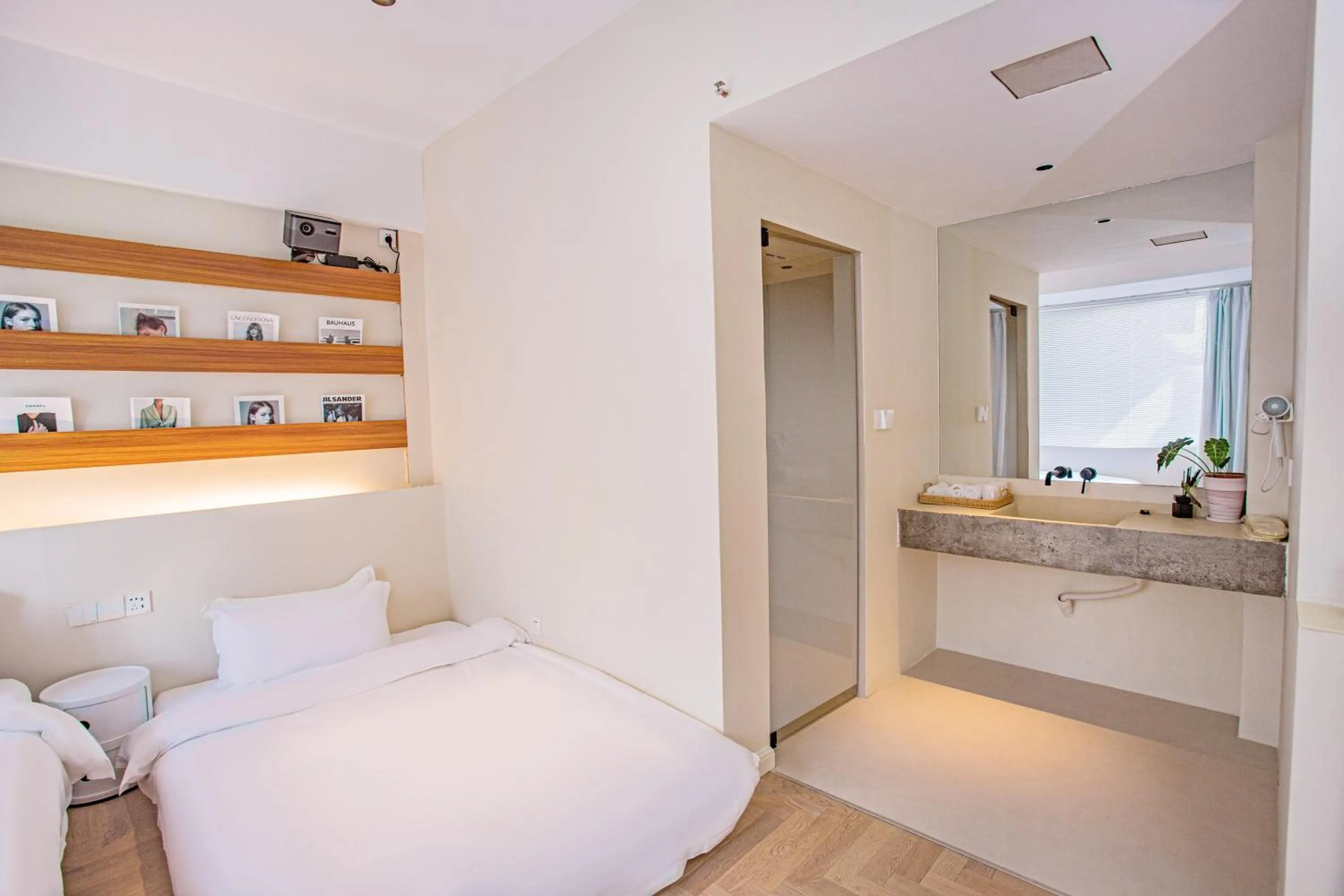 Bed in IM Waiting Hotel