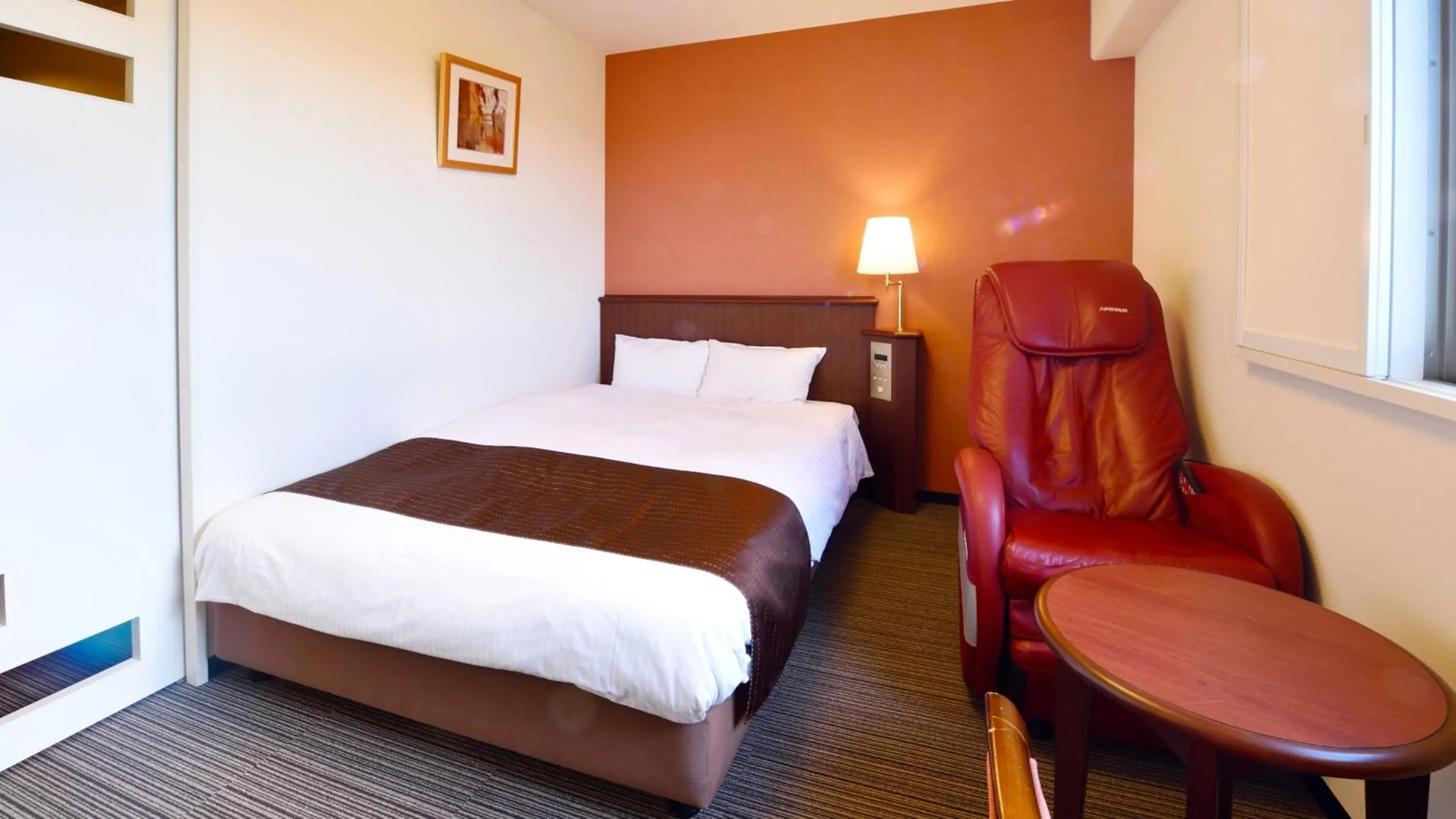 Bed in Hotel GRANDSPA AVENUE