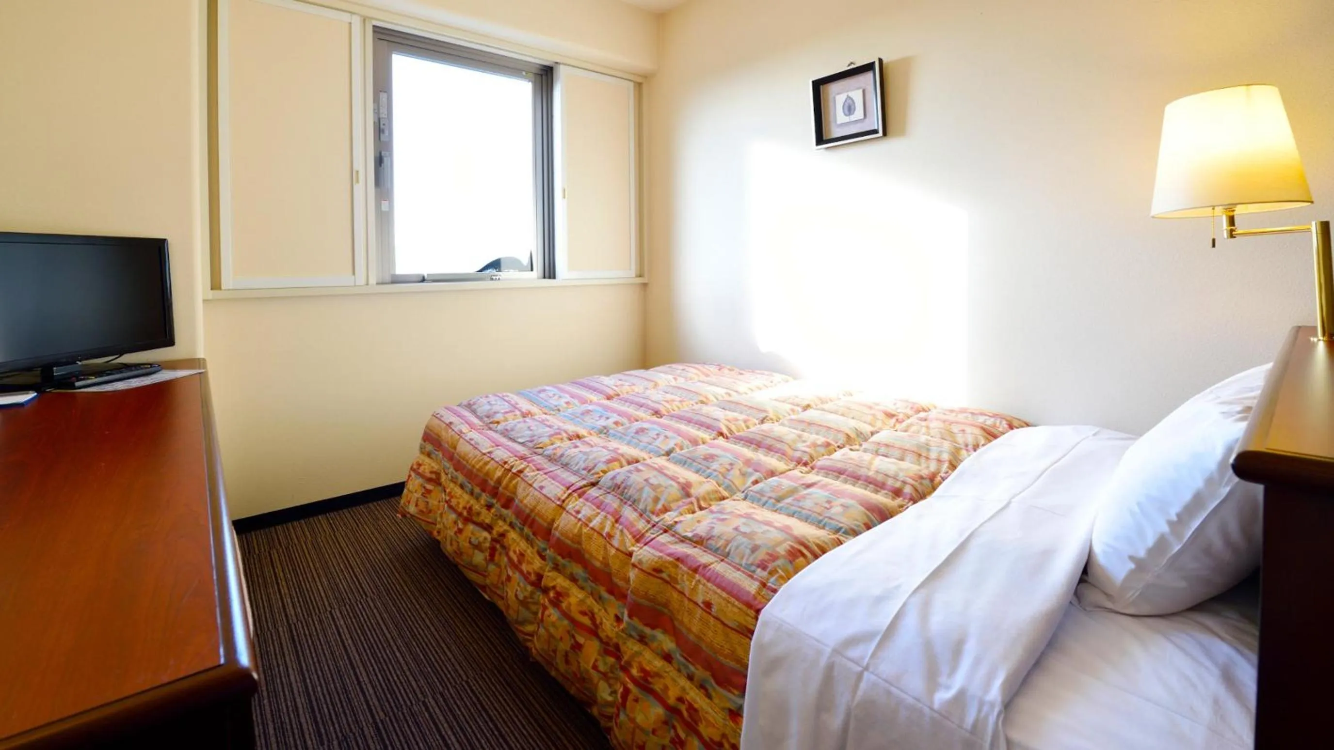 Bed in Hotel GRANDSPA AVENUE