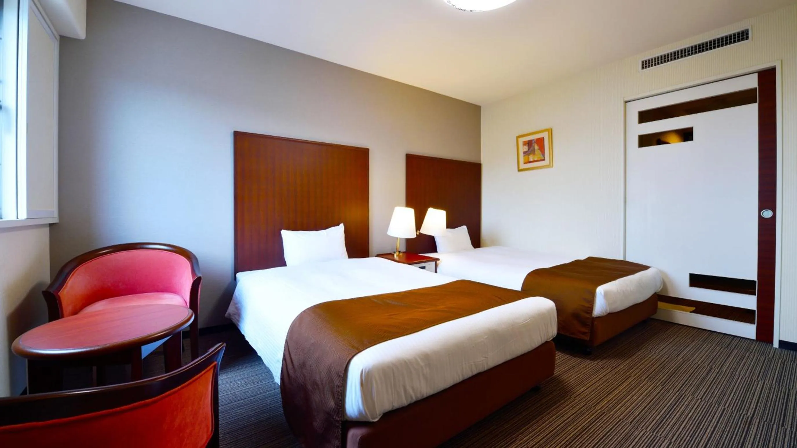 Bed in Hotel GRANDSPA AVENUE