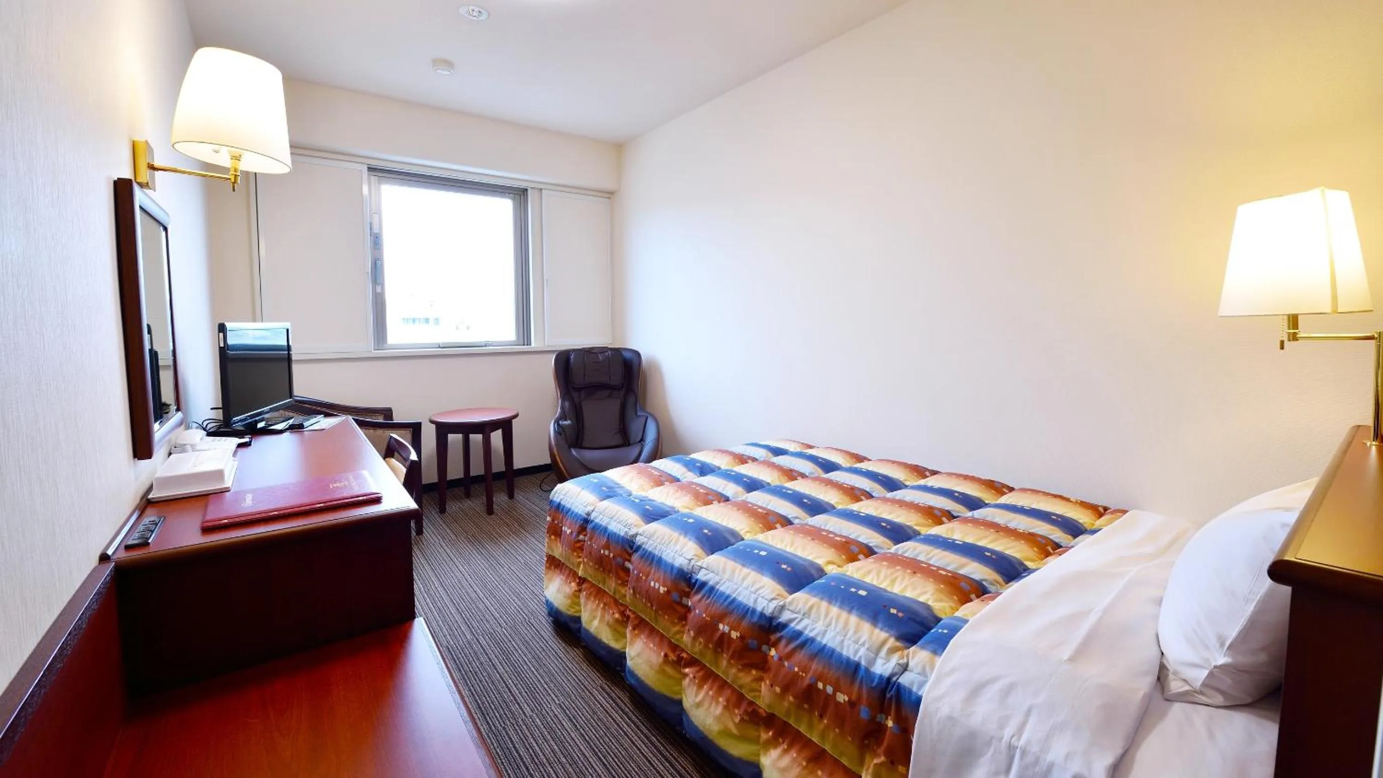 Bed in Hotel GRANDSPA AVENUE