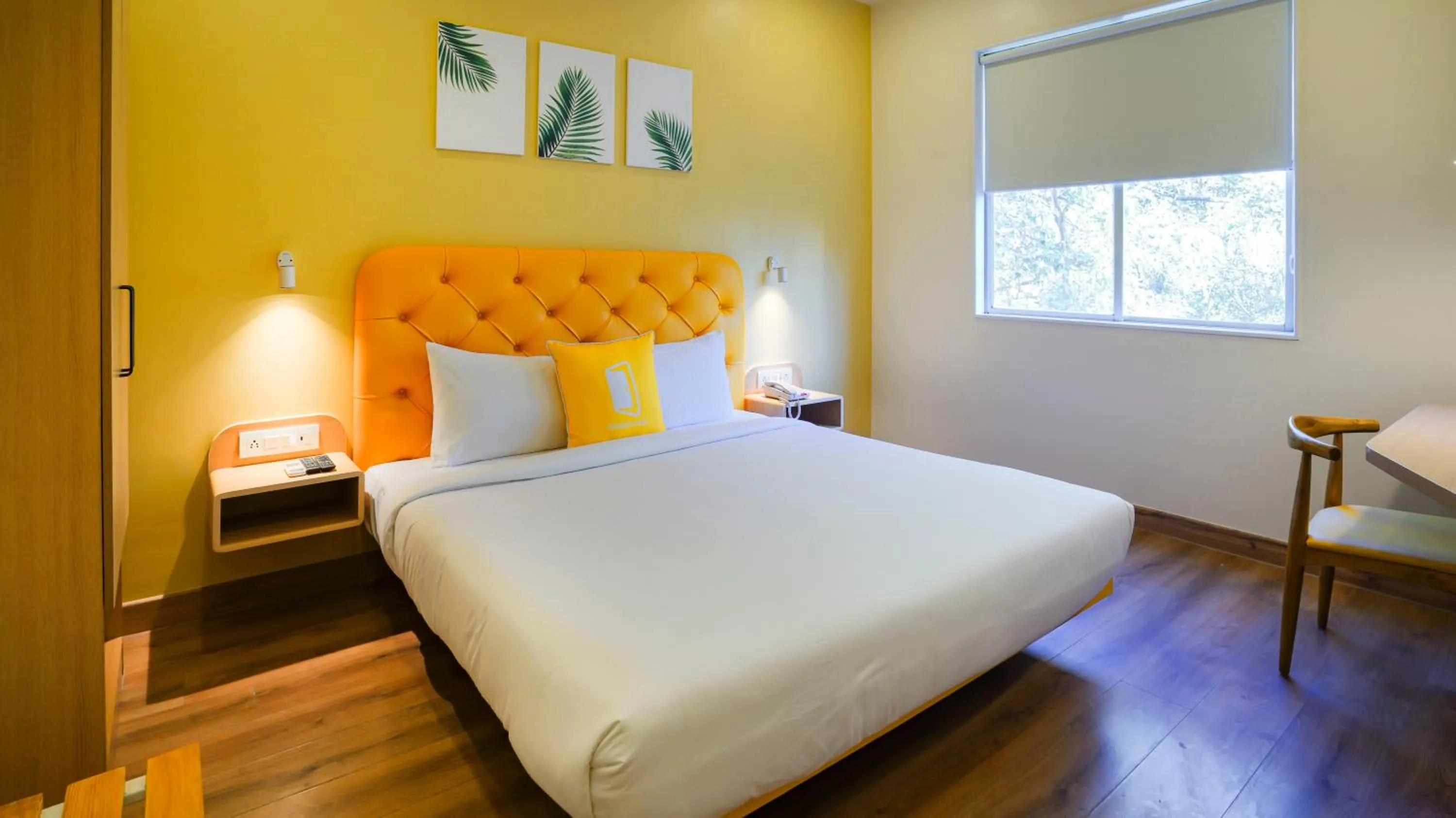 Photo of the whole room, Bed in Bloom Hotel - Magarpatta