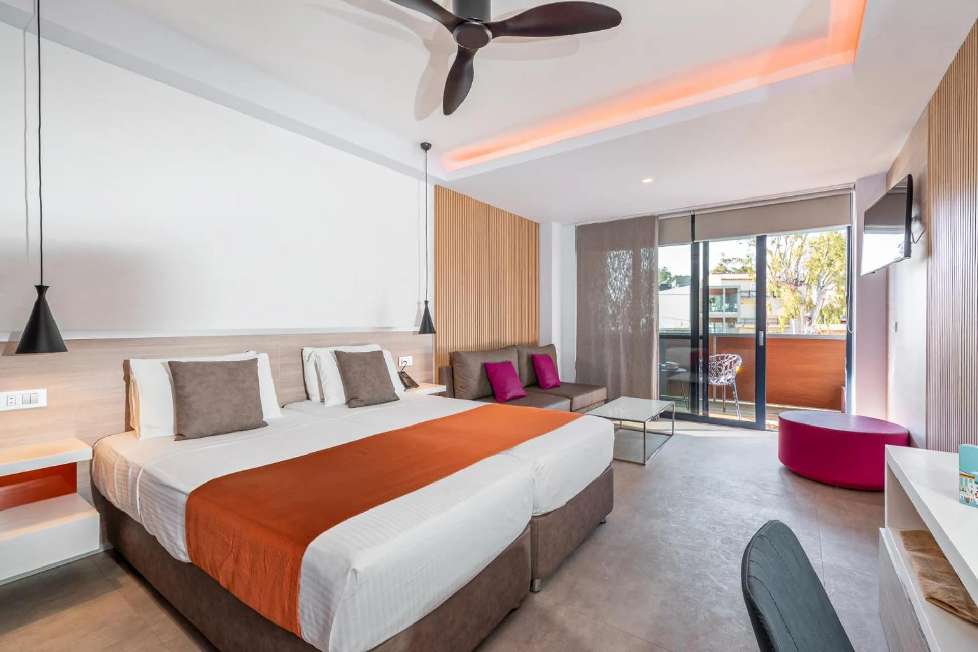 Seating area, Bed in Harmony Boutique Resort - Adults oriented