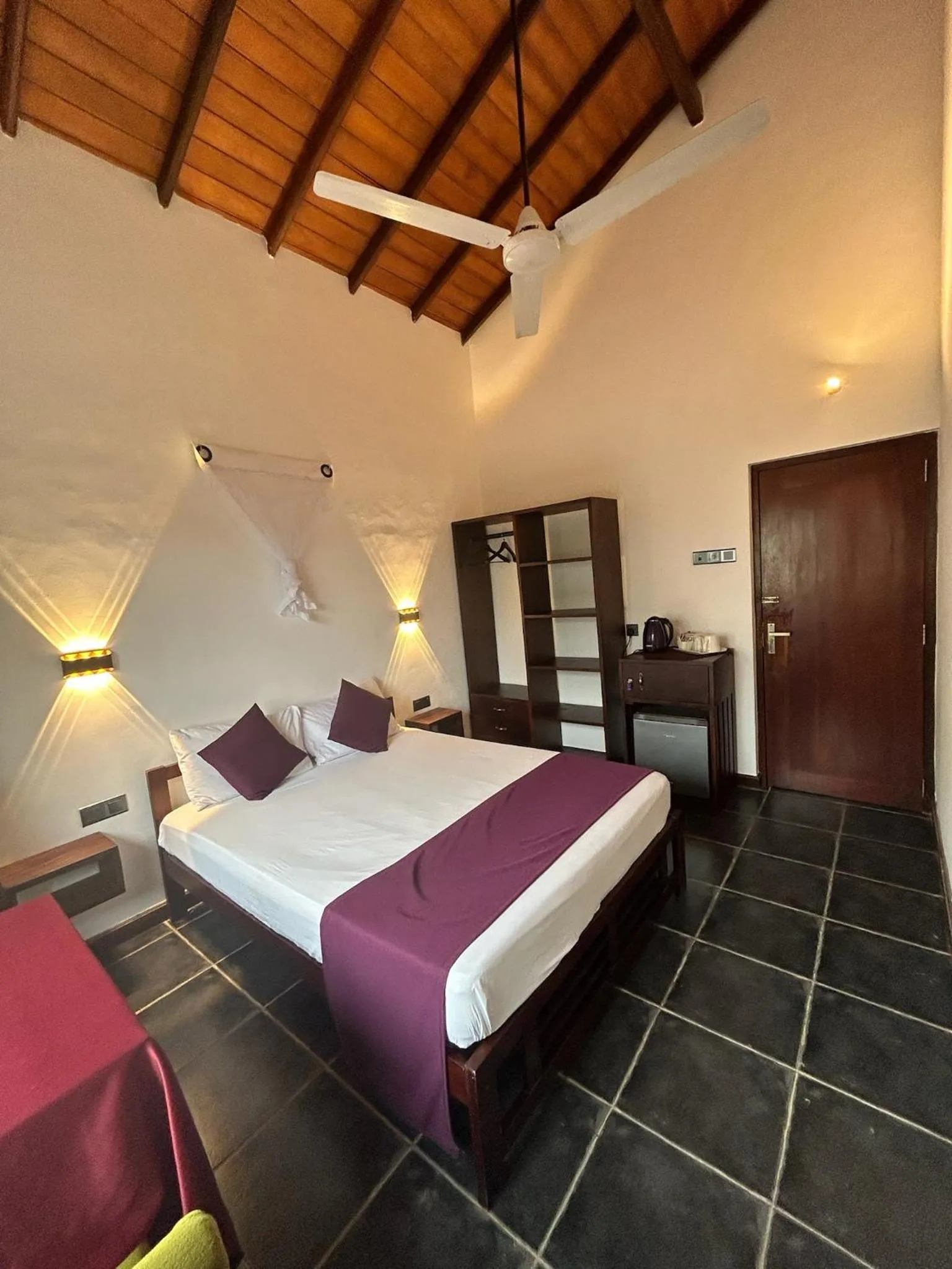 Bed in Reef Bungalow Hotel