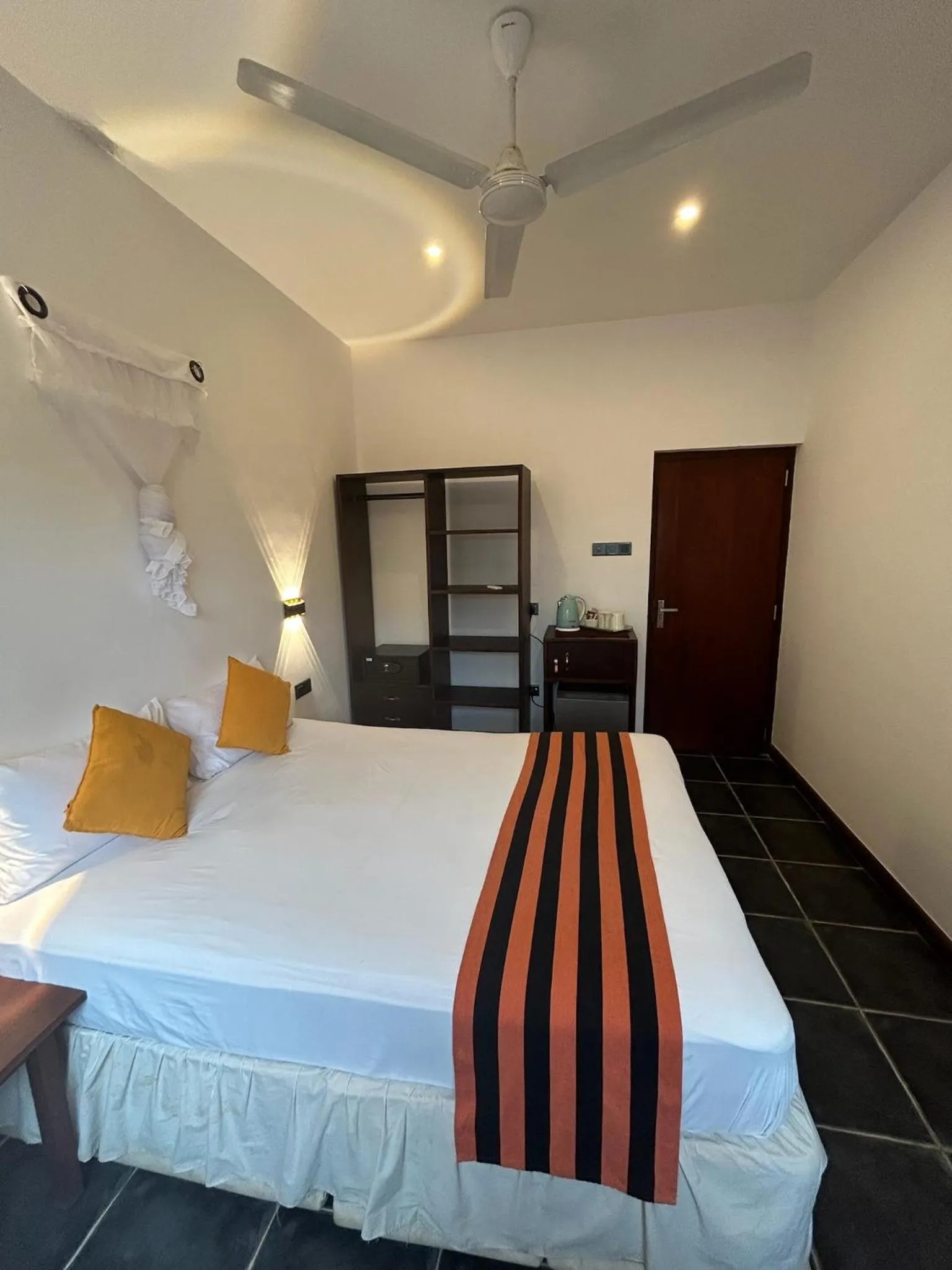 Bed in Reef Bungalow Hotel