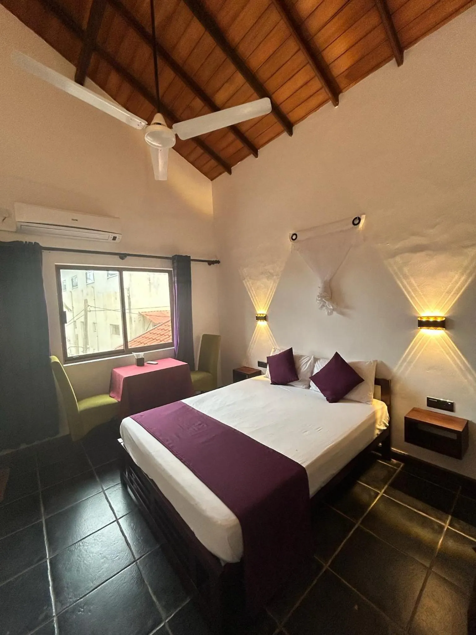 Bed in Reef Bungalow Hotel