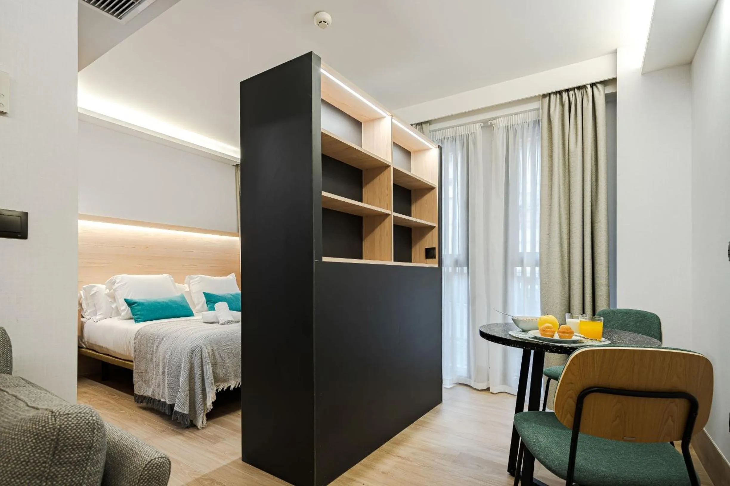 Bed in Feelathome Ventas Suites