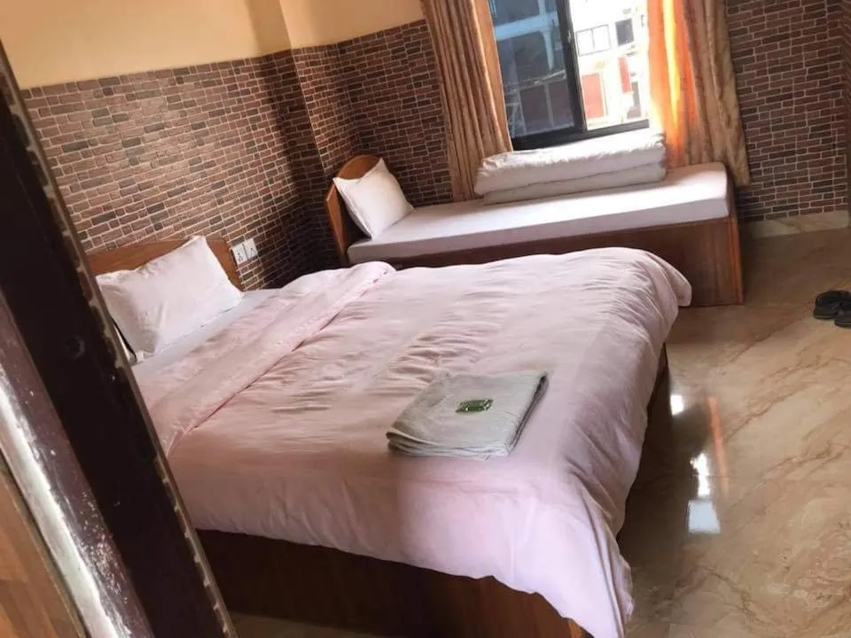 Bed in Hotel Center Inn Lake