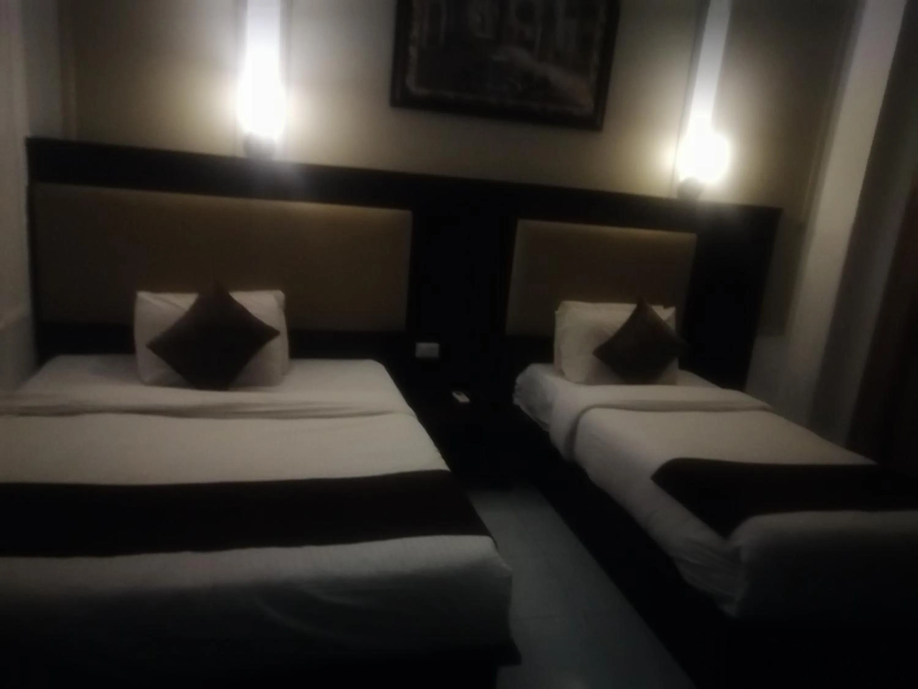 Bed in Gardenia Hotel