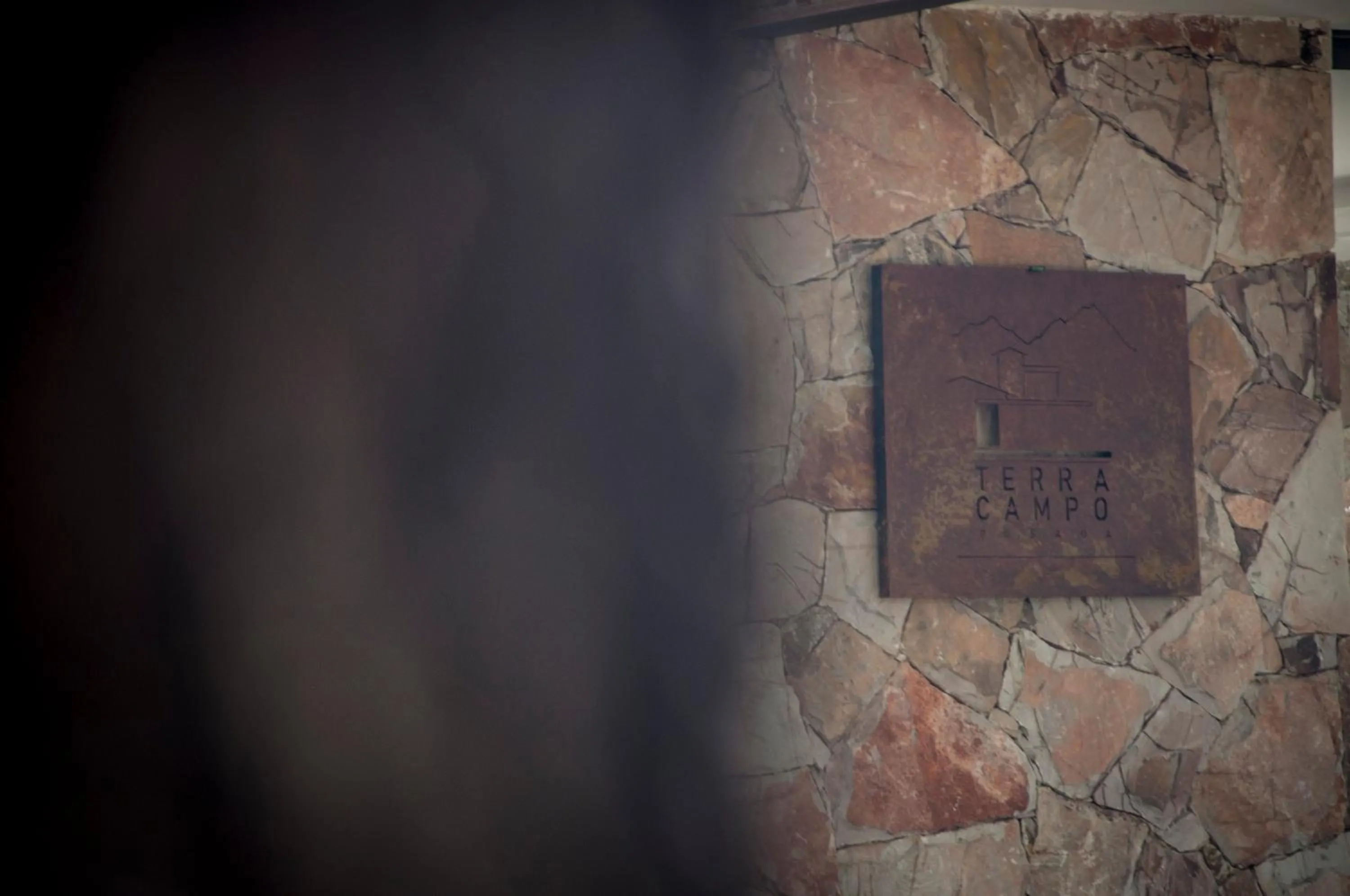 Property logo or sign in Terra Campo Posada