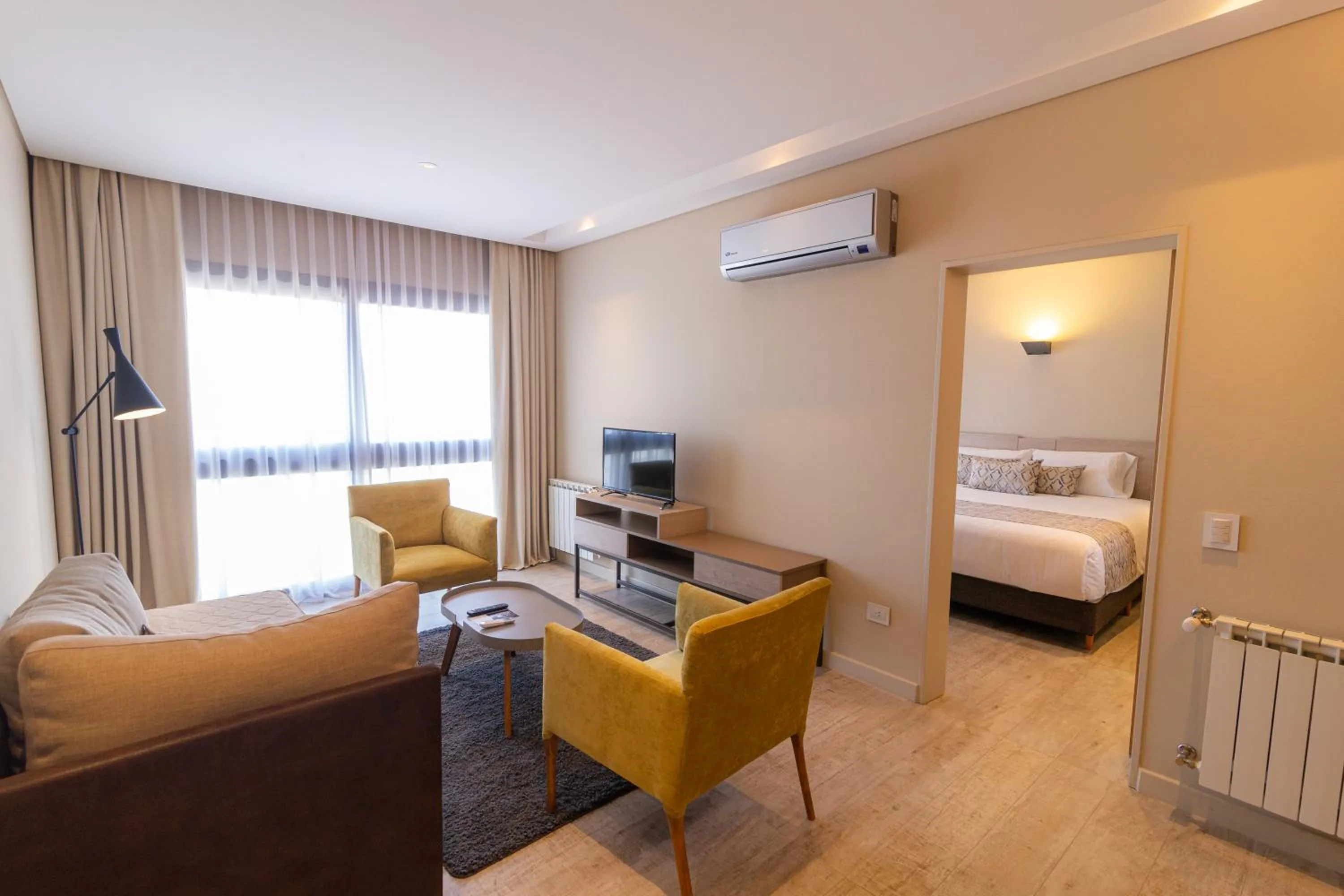 Living room, Bed in Hotel Treinta-Seis