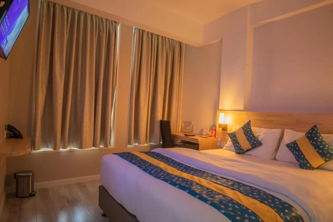 Bed in Tourist Inn Grand