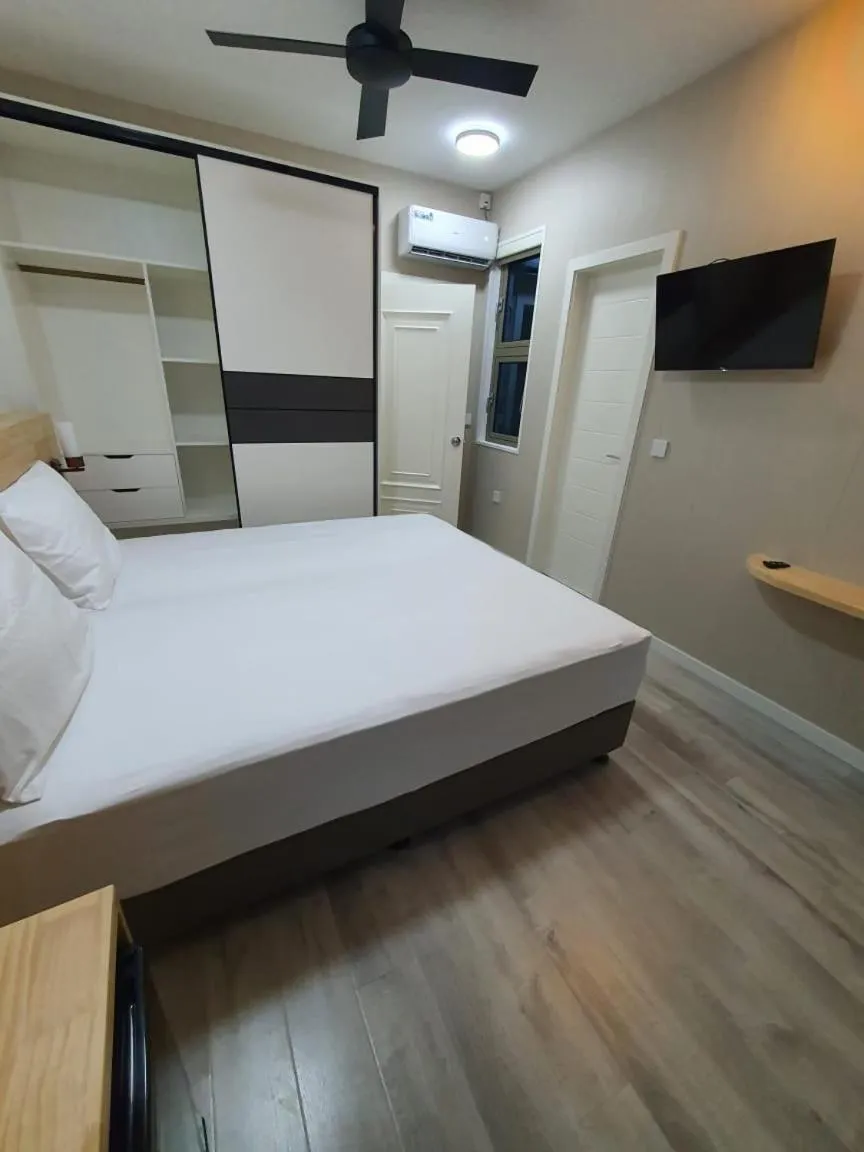 Bed in Tourist Inn Grand