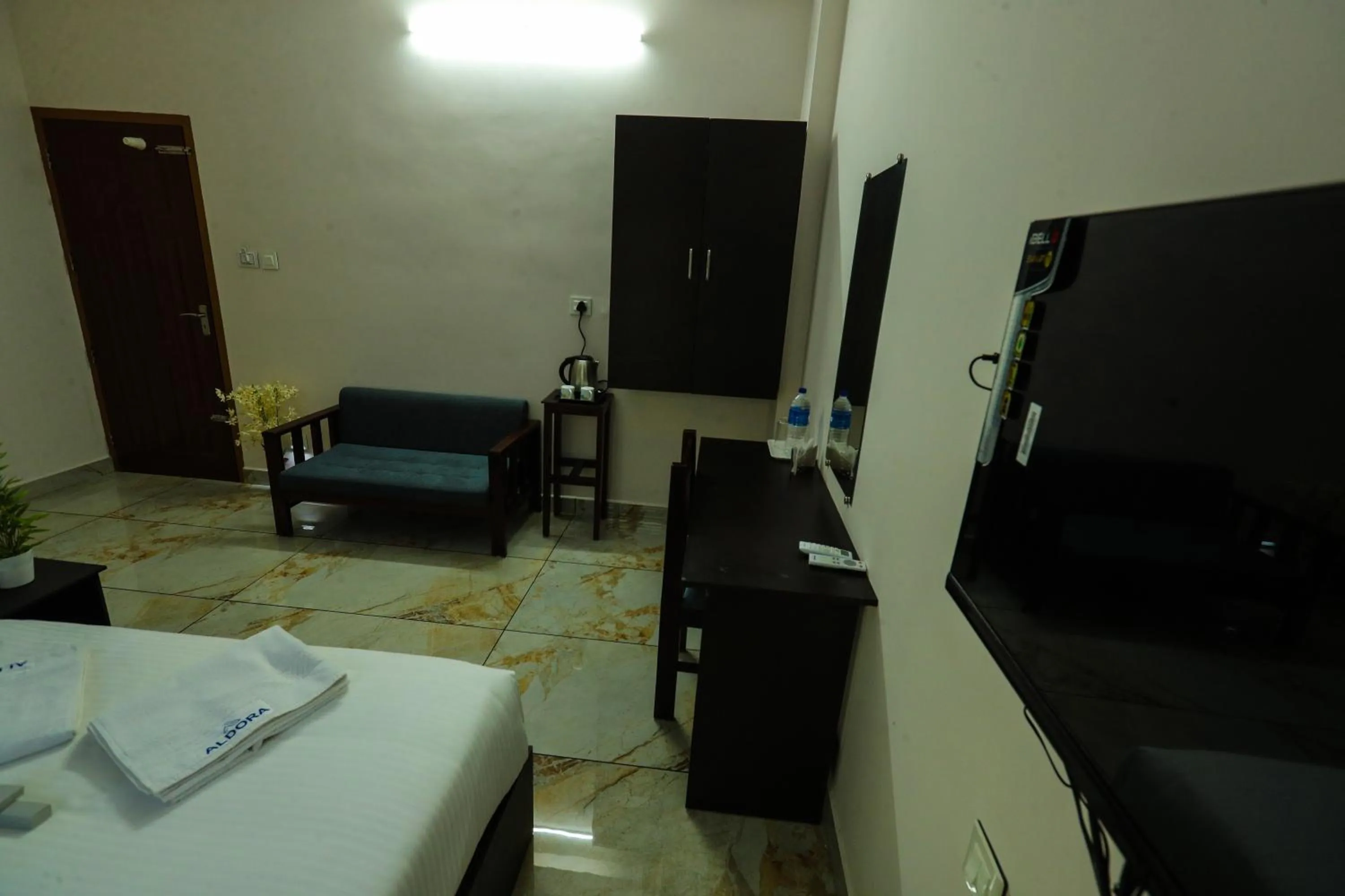 Bed in Aldora Airport Residency