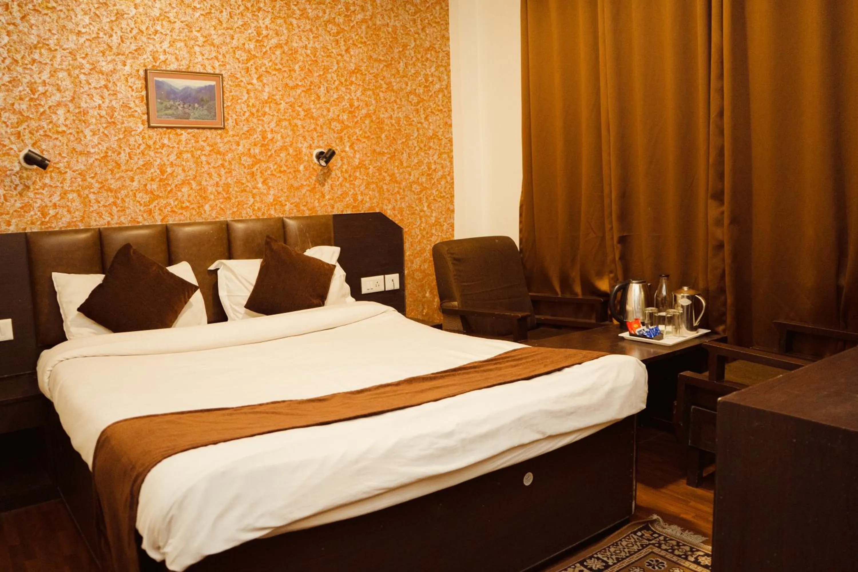 Photo of the whole room, Bed in Hotel Siddhi Vinayak Regency, Mg Marg