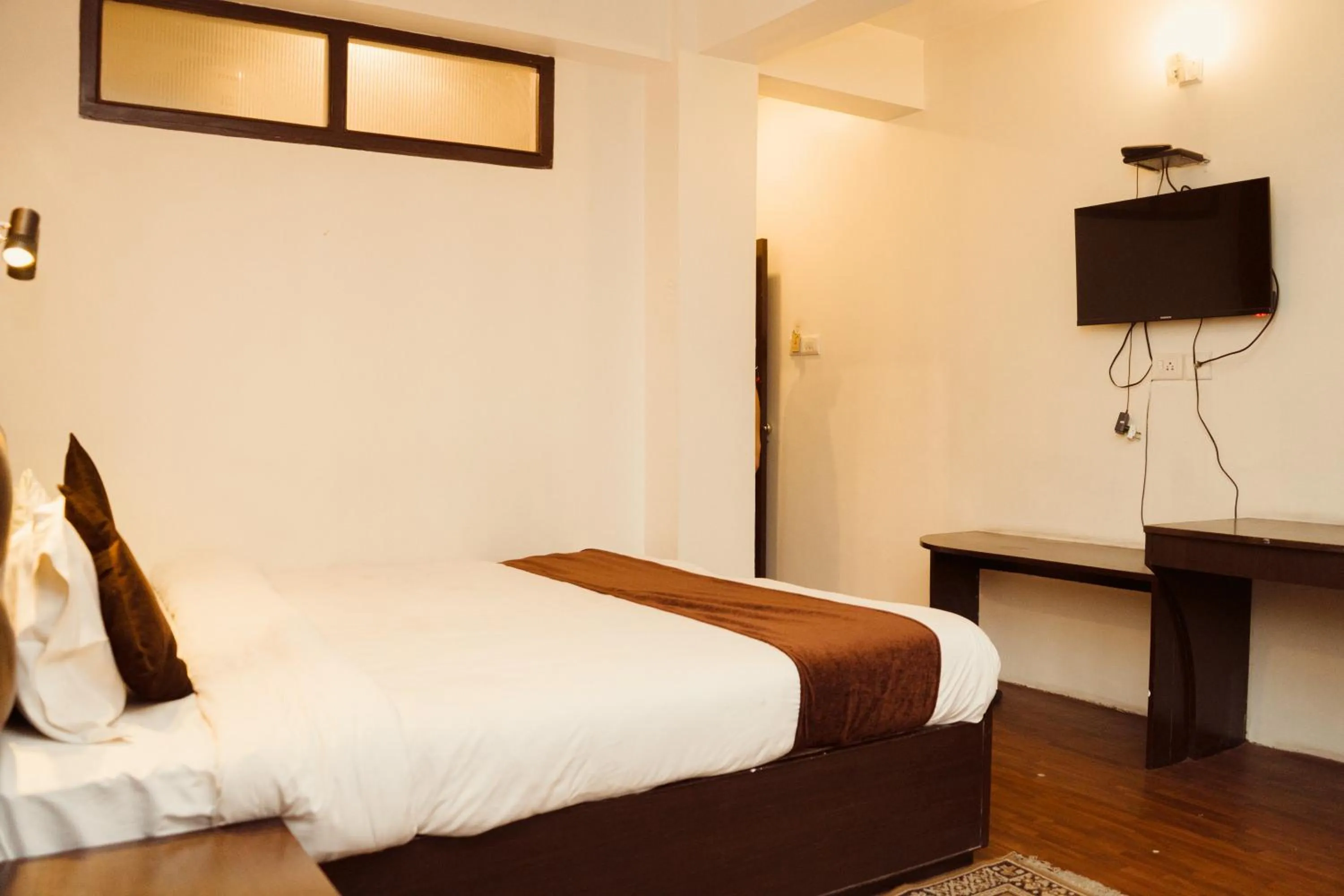 Bed in Hotel Siddhi Vinayak Regency, Mg Marg