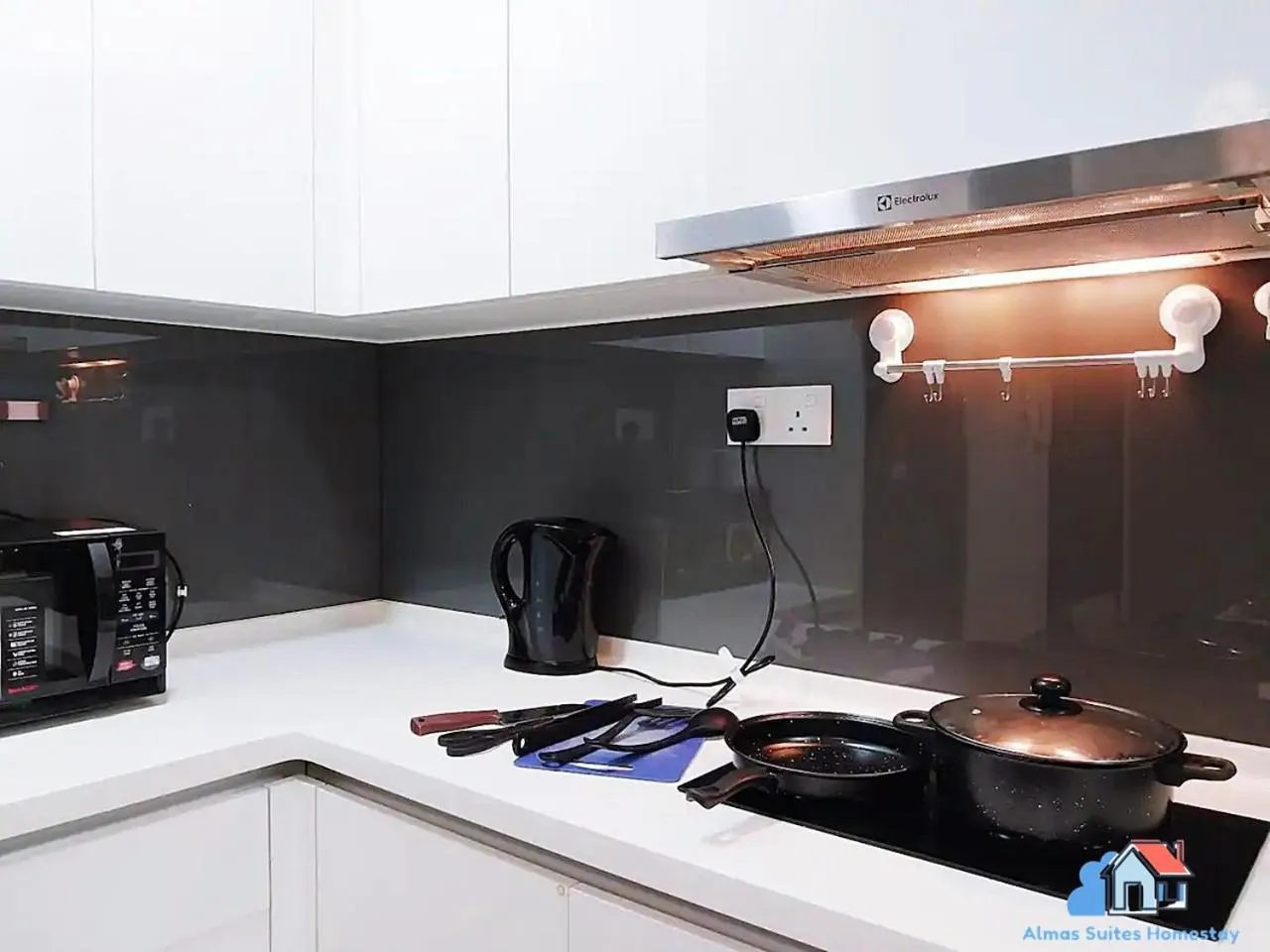 Kitchen or kitchenette in Almas Suites @ Puteri Harbour