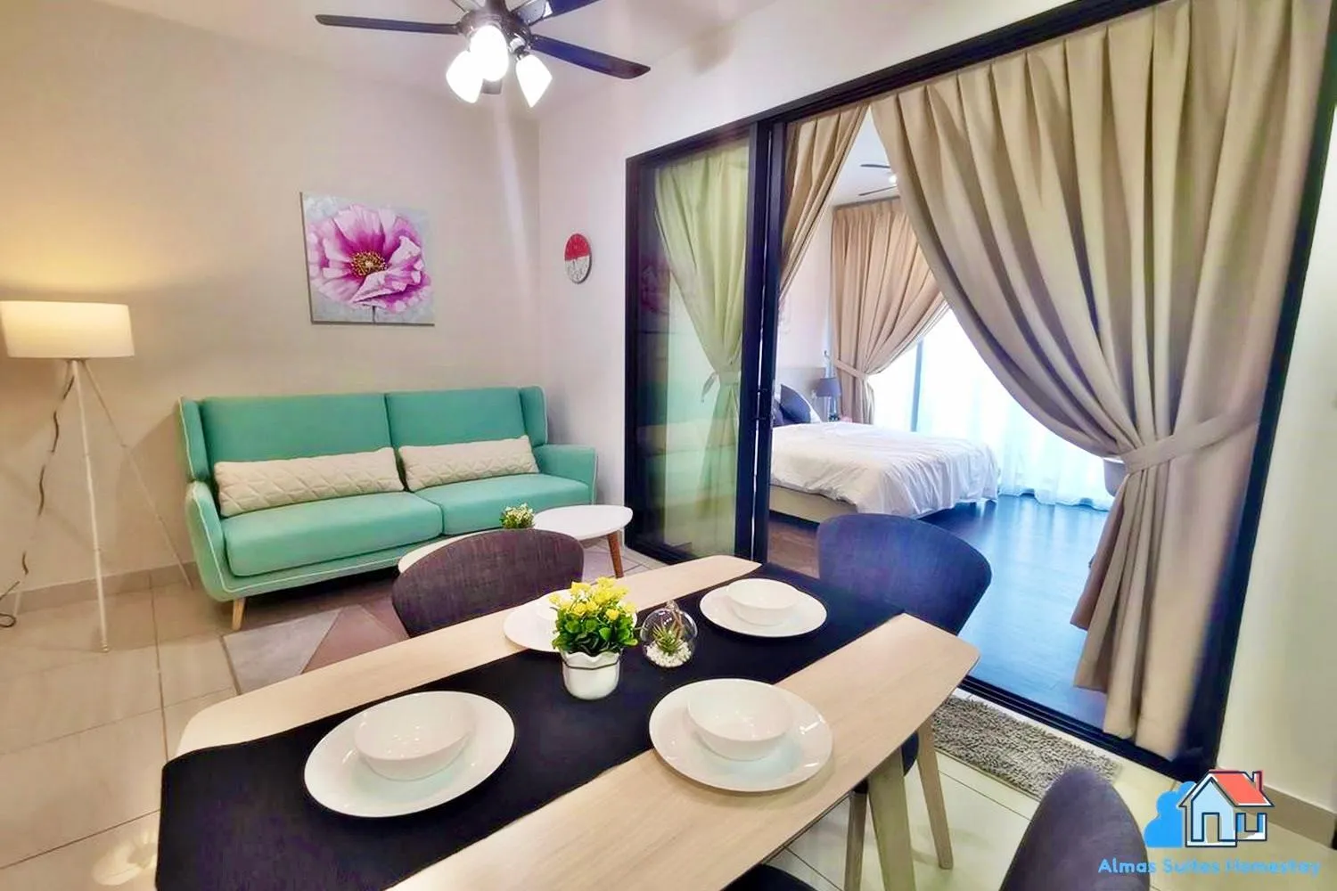 Living room, Bed in Almas Suites @ Puteri Harbour