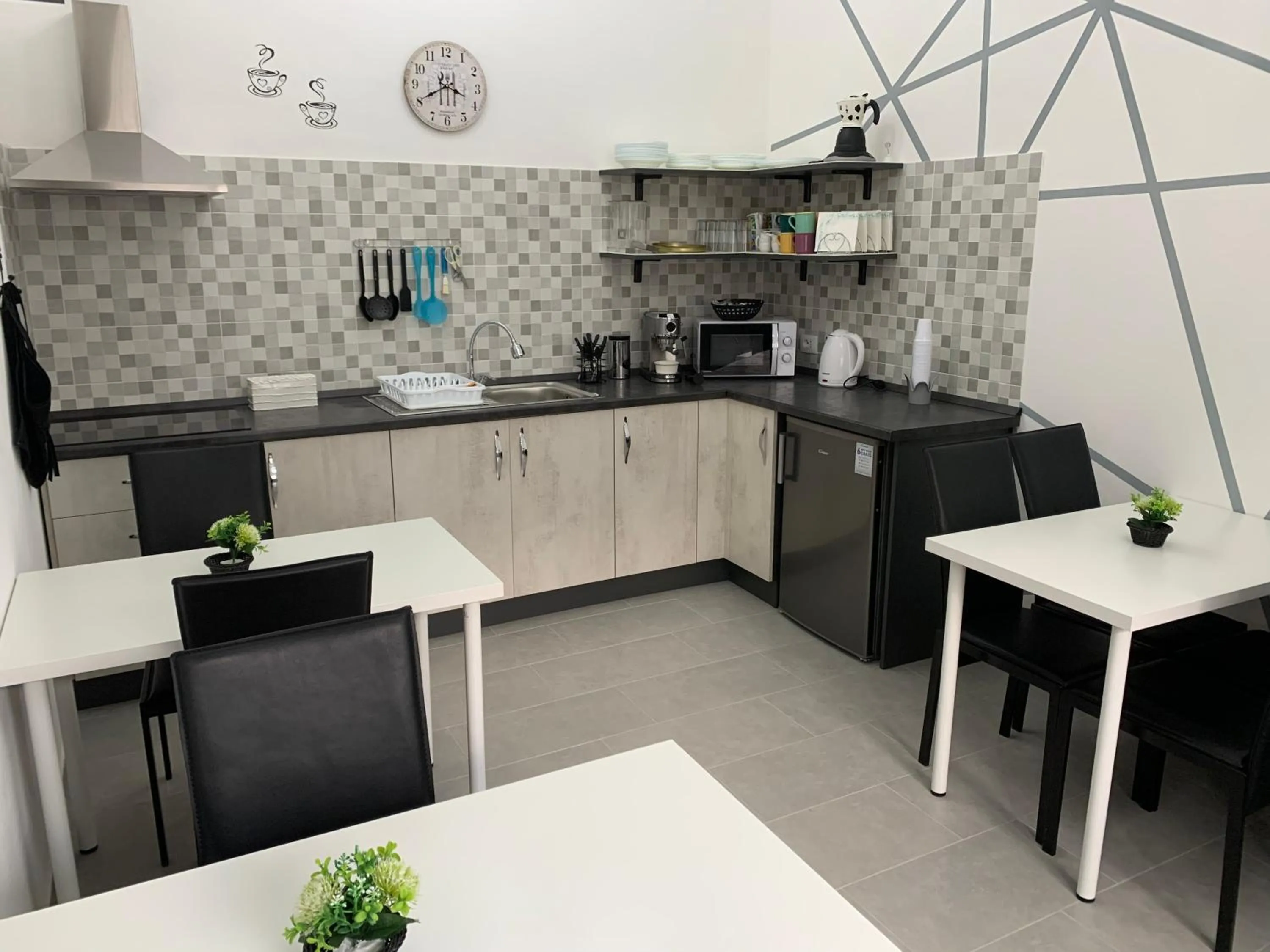 Coffee/tea facilities, Kitchen/Kitchenette in B&B Ramura