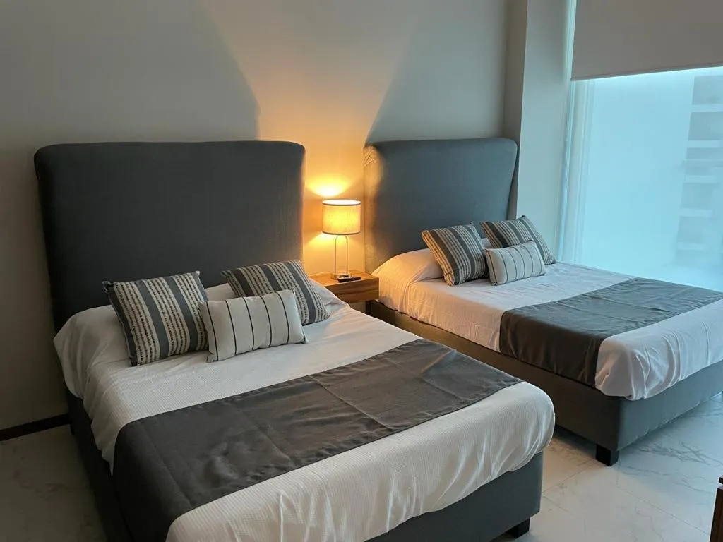 Photo of the whole room, Bed in Maritima Front Beach Apartment