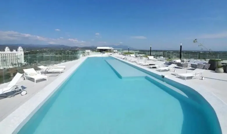 Pool view in Maritima Front Beach Apartment