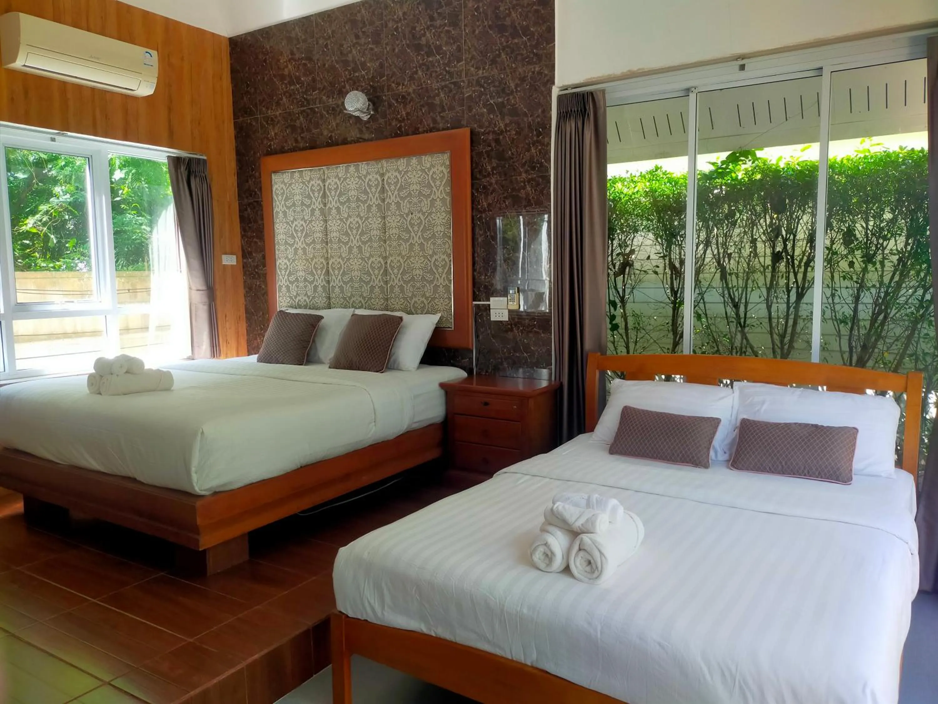 Bed in ภูฝ้ายวิลล่า Phufai villa