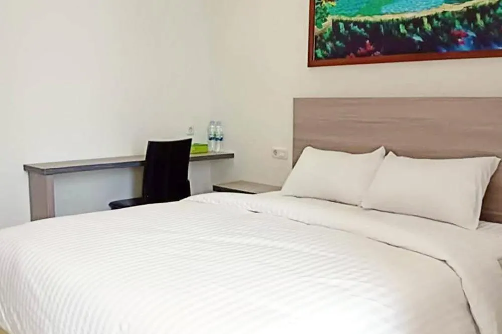 Bed in Twospaces Living at Maximus inn