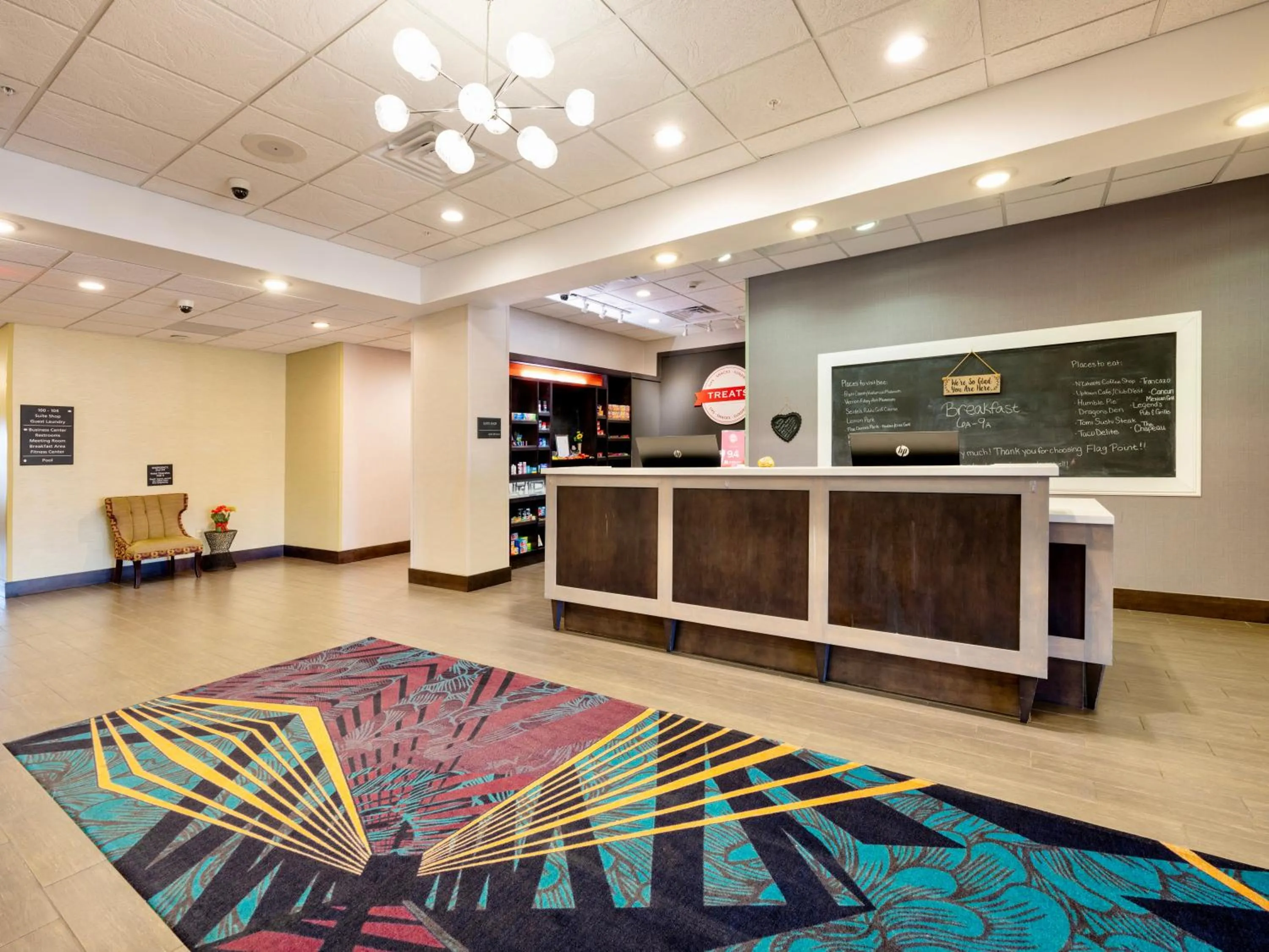 Lobby or reception in Flag Point Inn and Suites Pratt by FairBridge