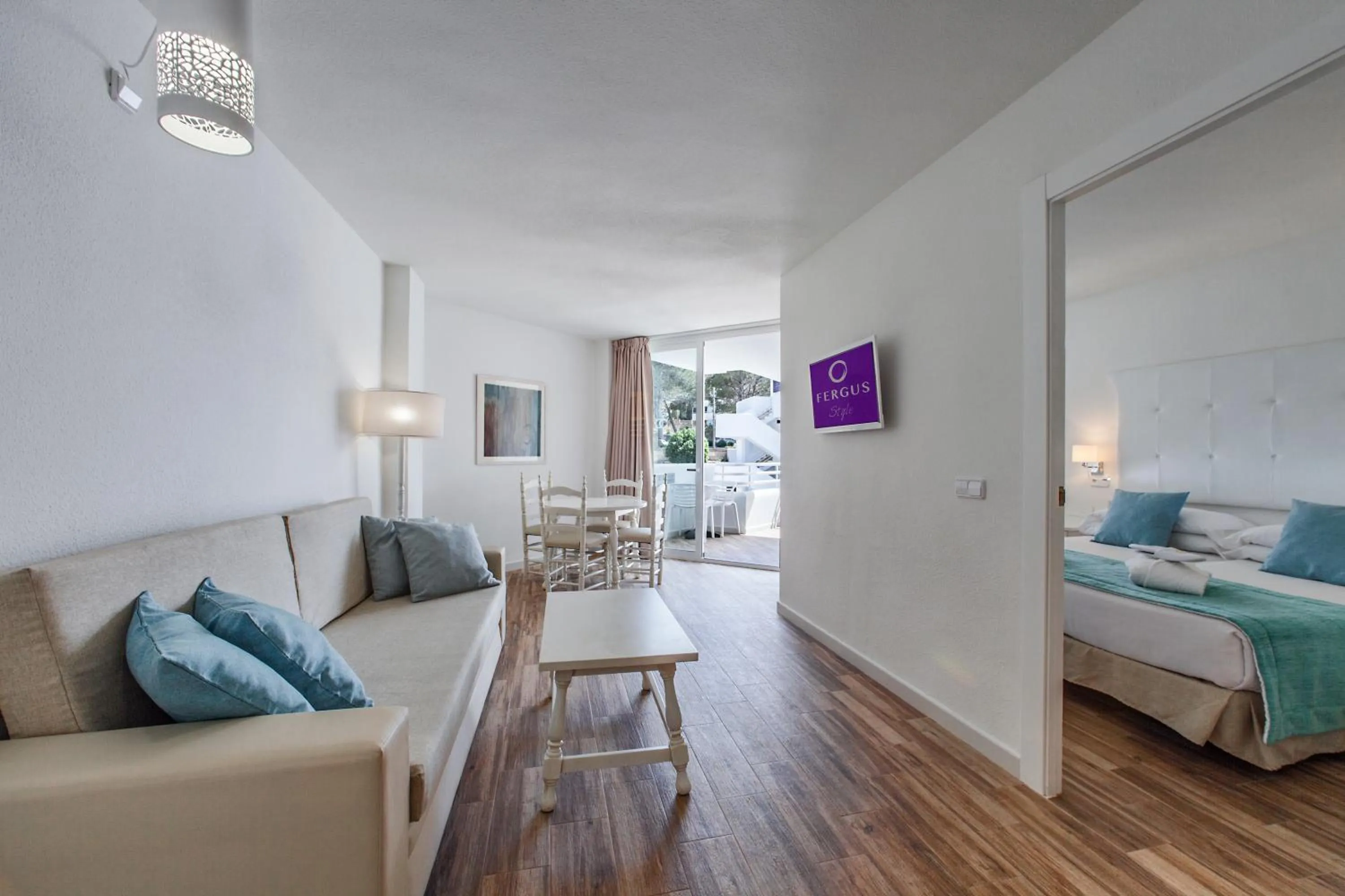 Photo of the whole room, Bed in FERGUS Style Cala Blanca Suites