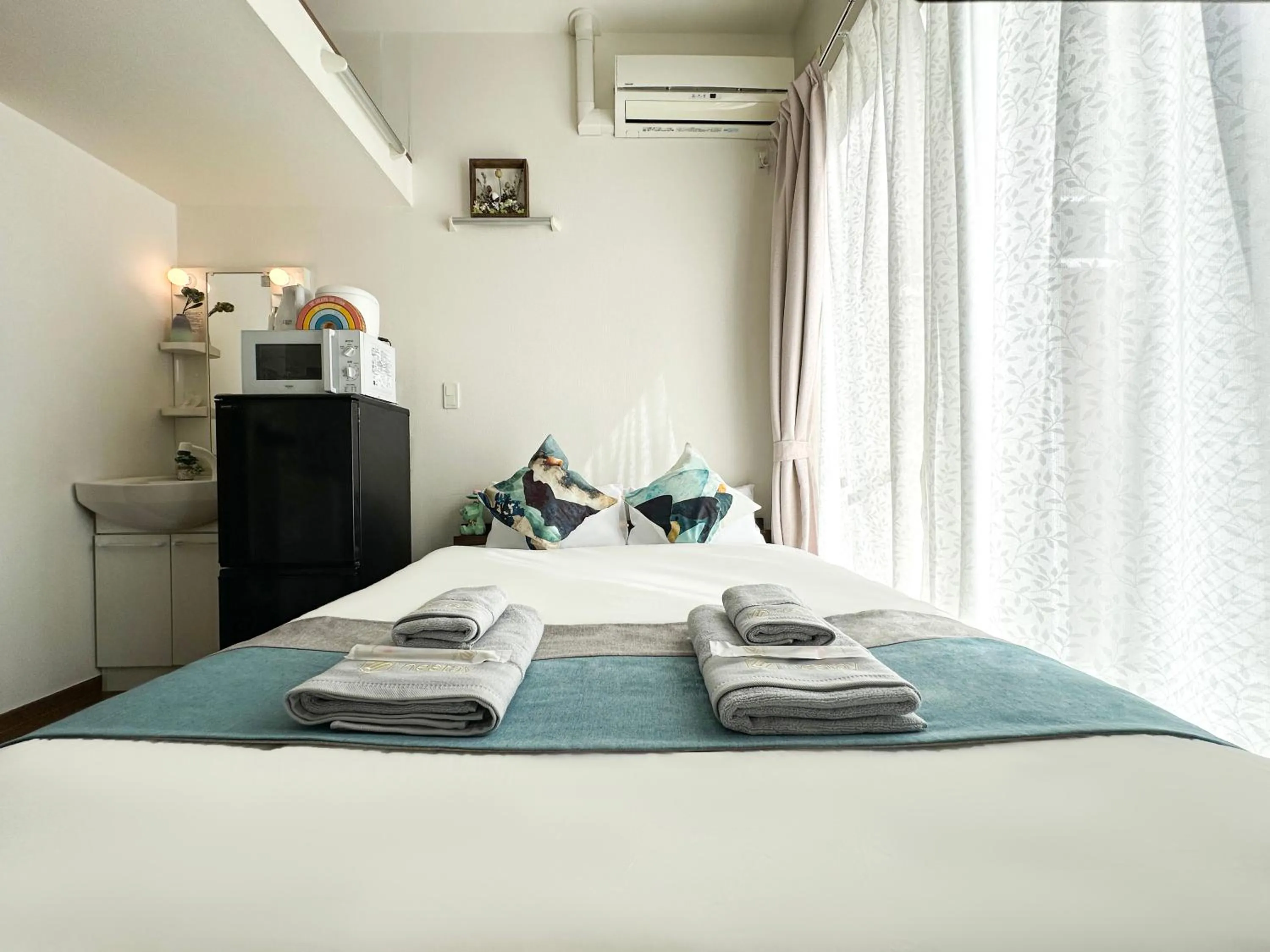 Bed in nestay suite tokyo ikebukuro