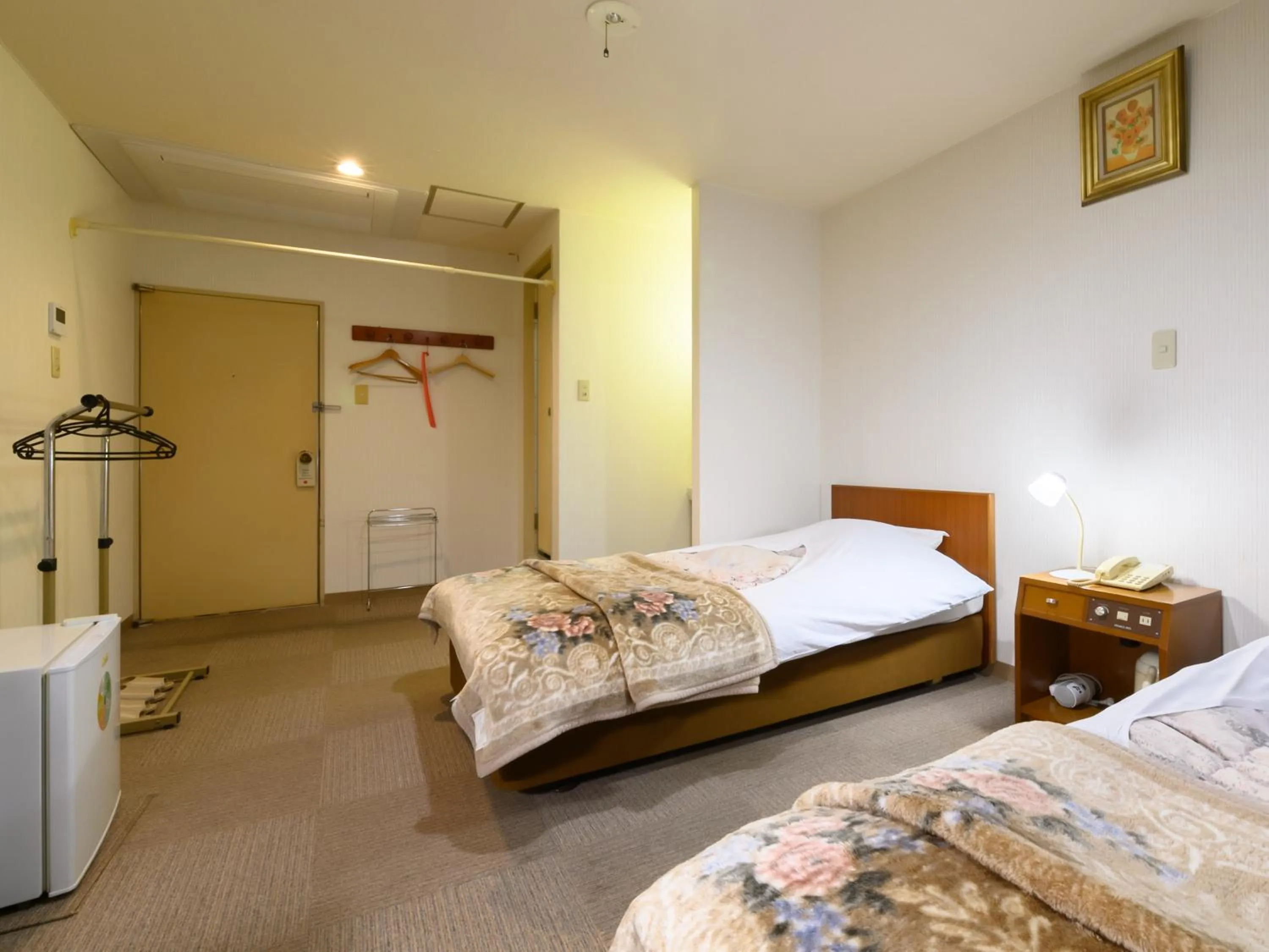 Bed in Business Ryokan Hotel Yukimiso