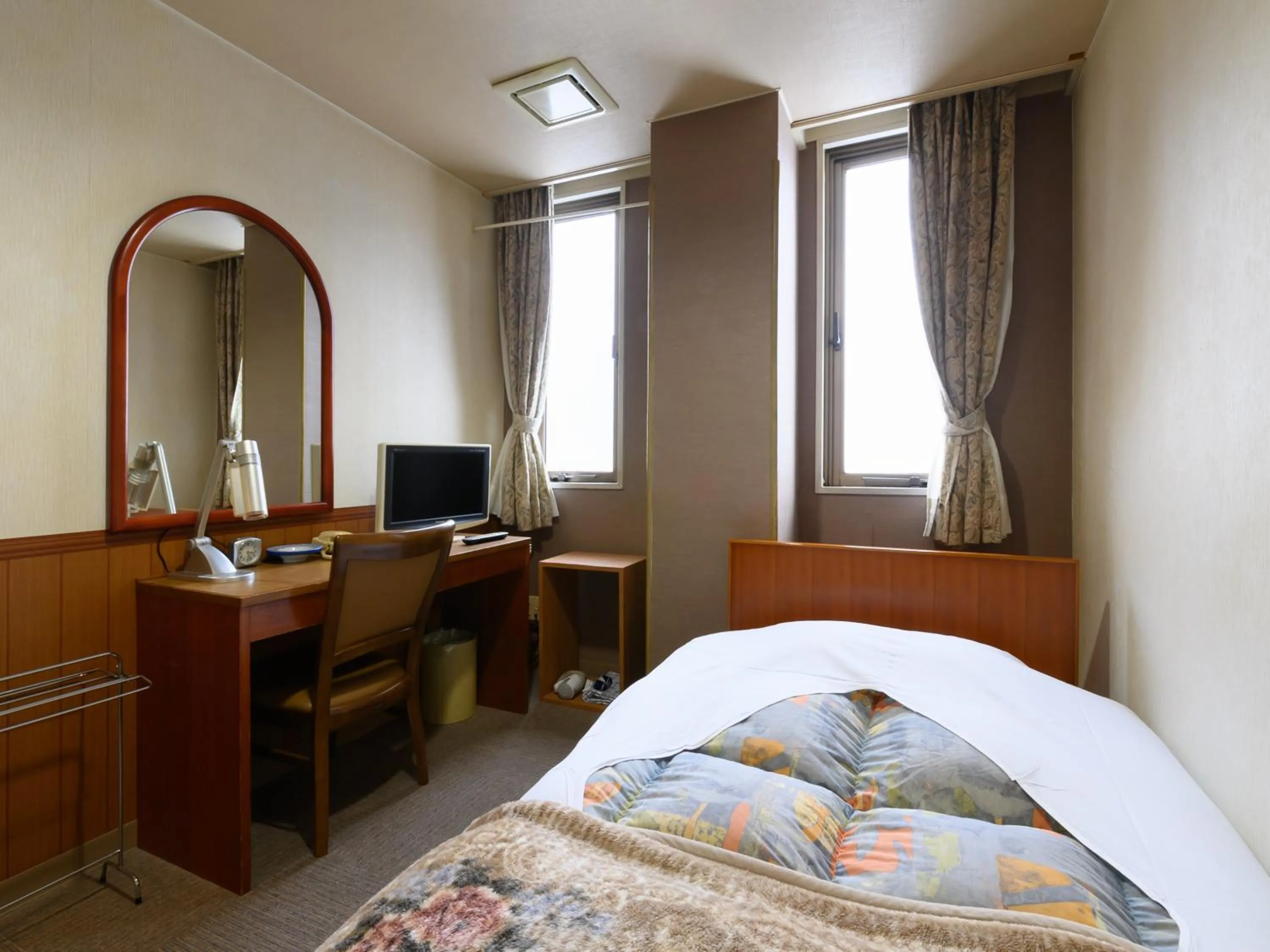 Bed in Business Ryokan Hotel Yukimiso