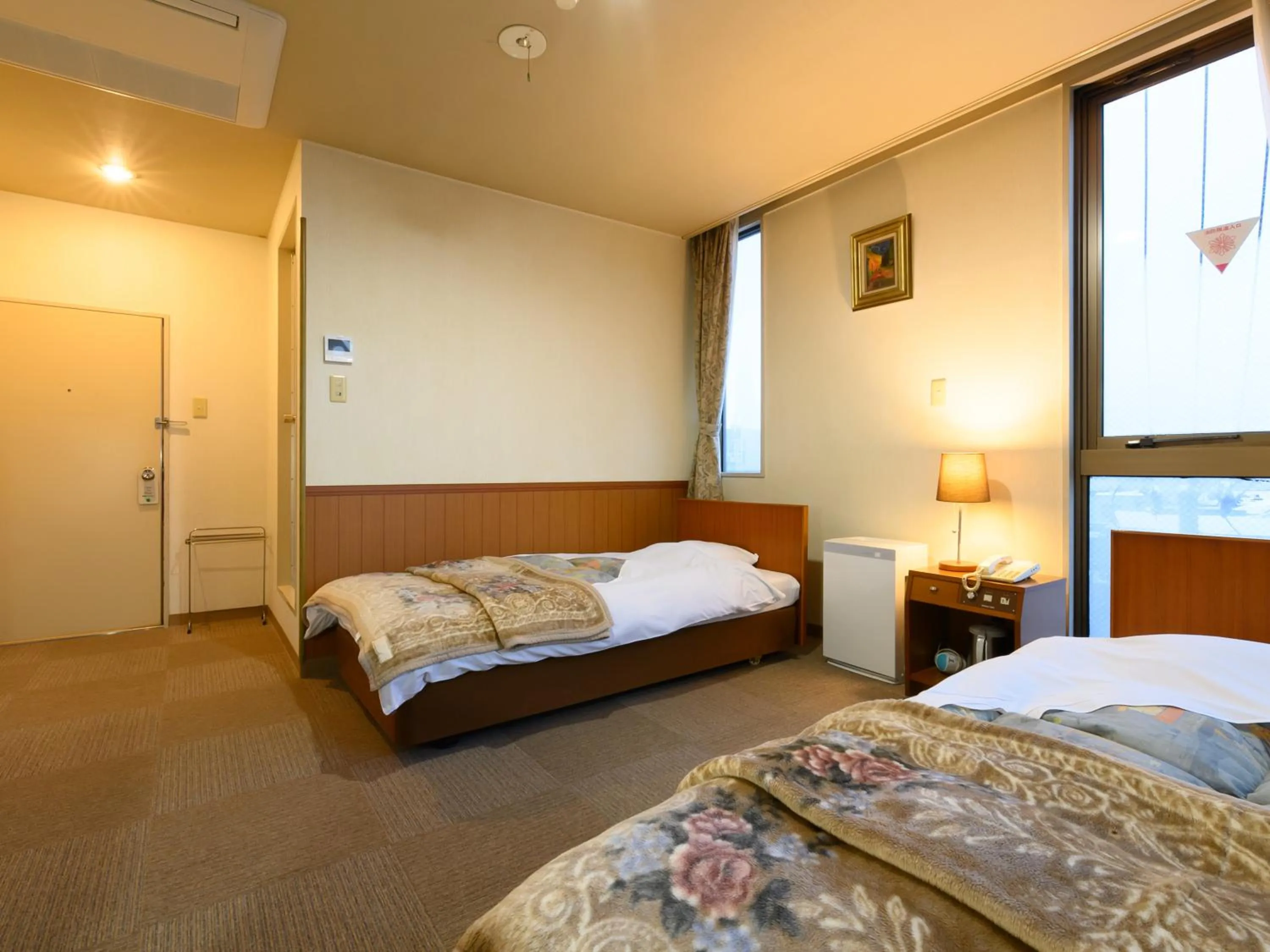 Bed in Business Ryokan Hotel Yukimiso