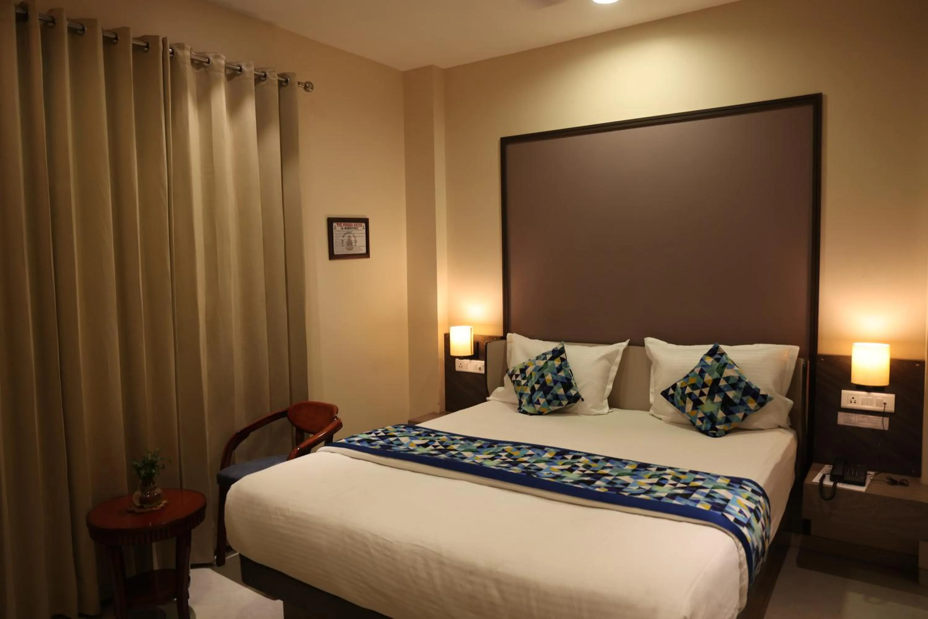 Photo of the whole room, Bed in Hotel Pinaka Inn