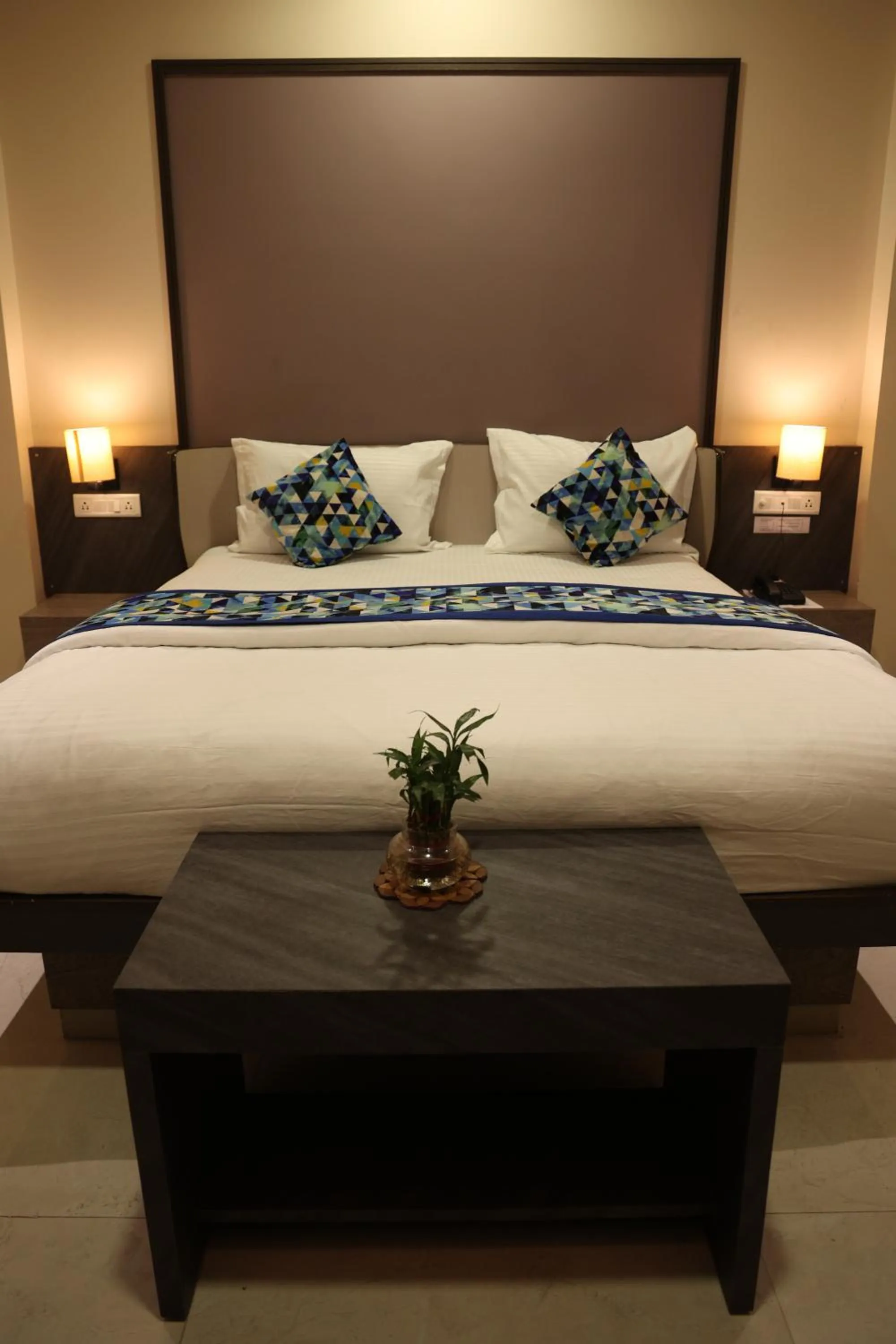 Bed in Hotel Pinaka Inn