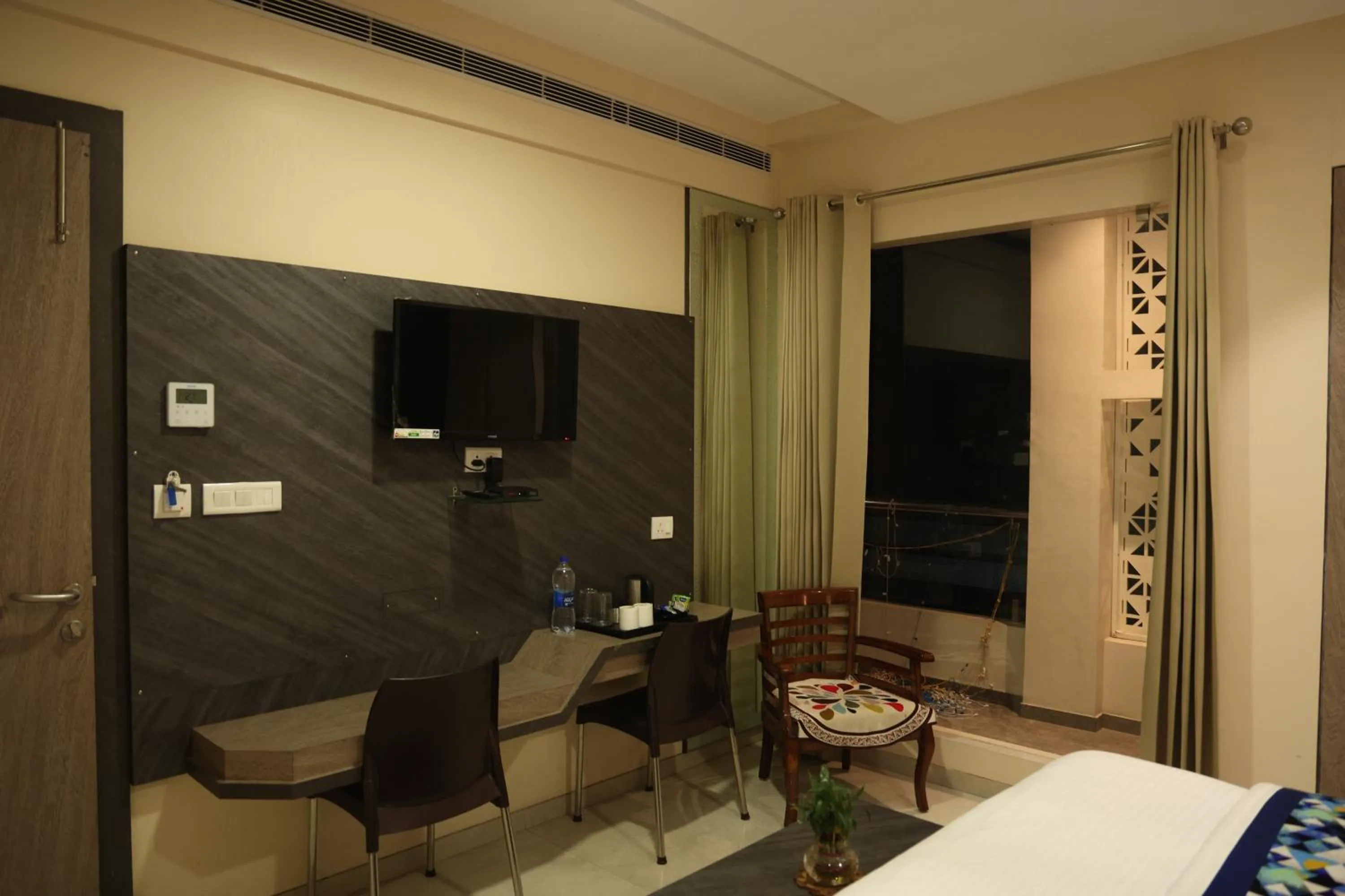 Bed in Hotel Pinaka Inn