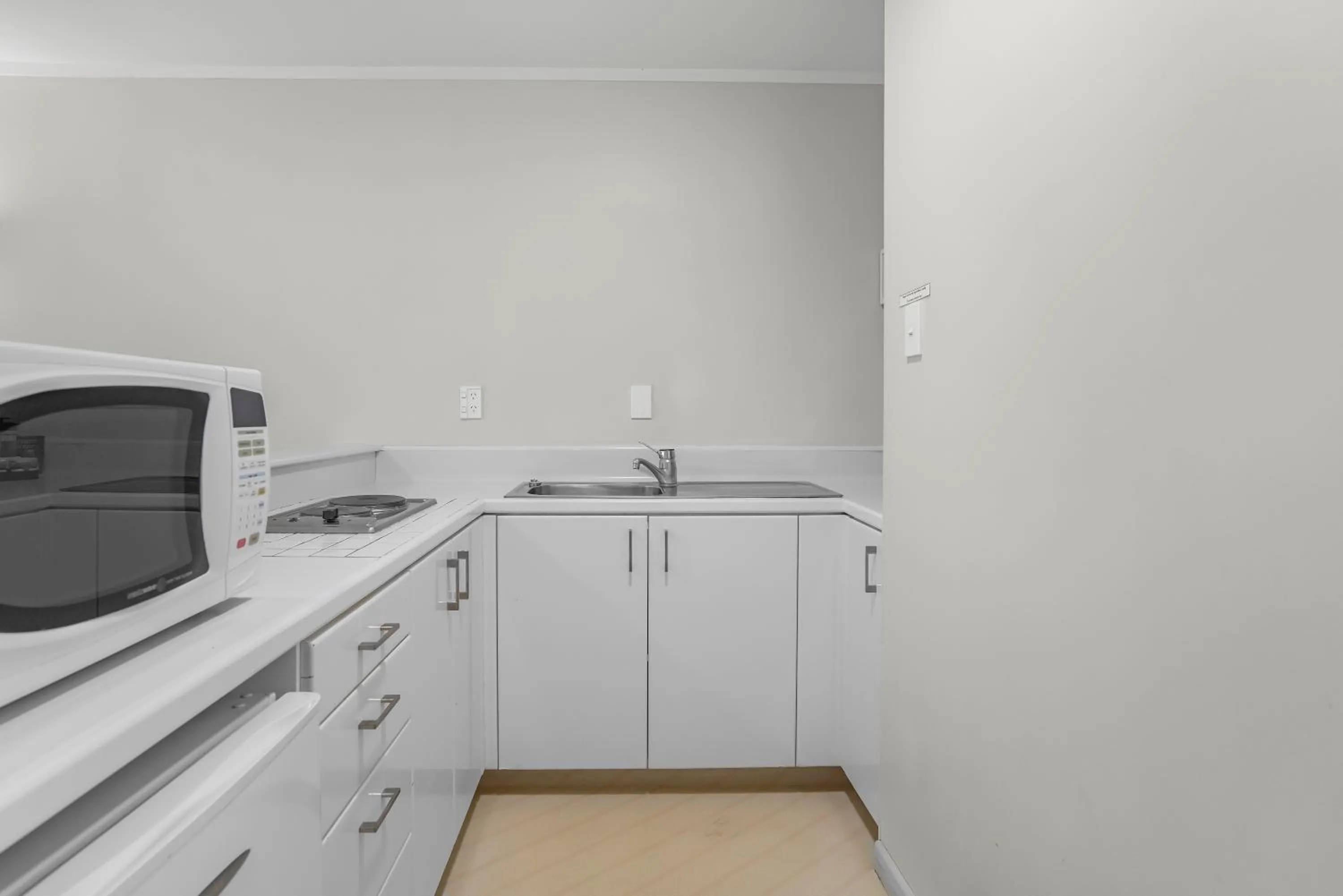 Kitchen or kitchenette in Capital Lodge Motor Inn