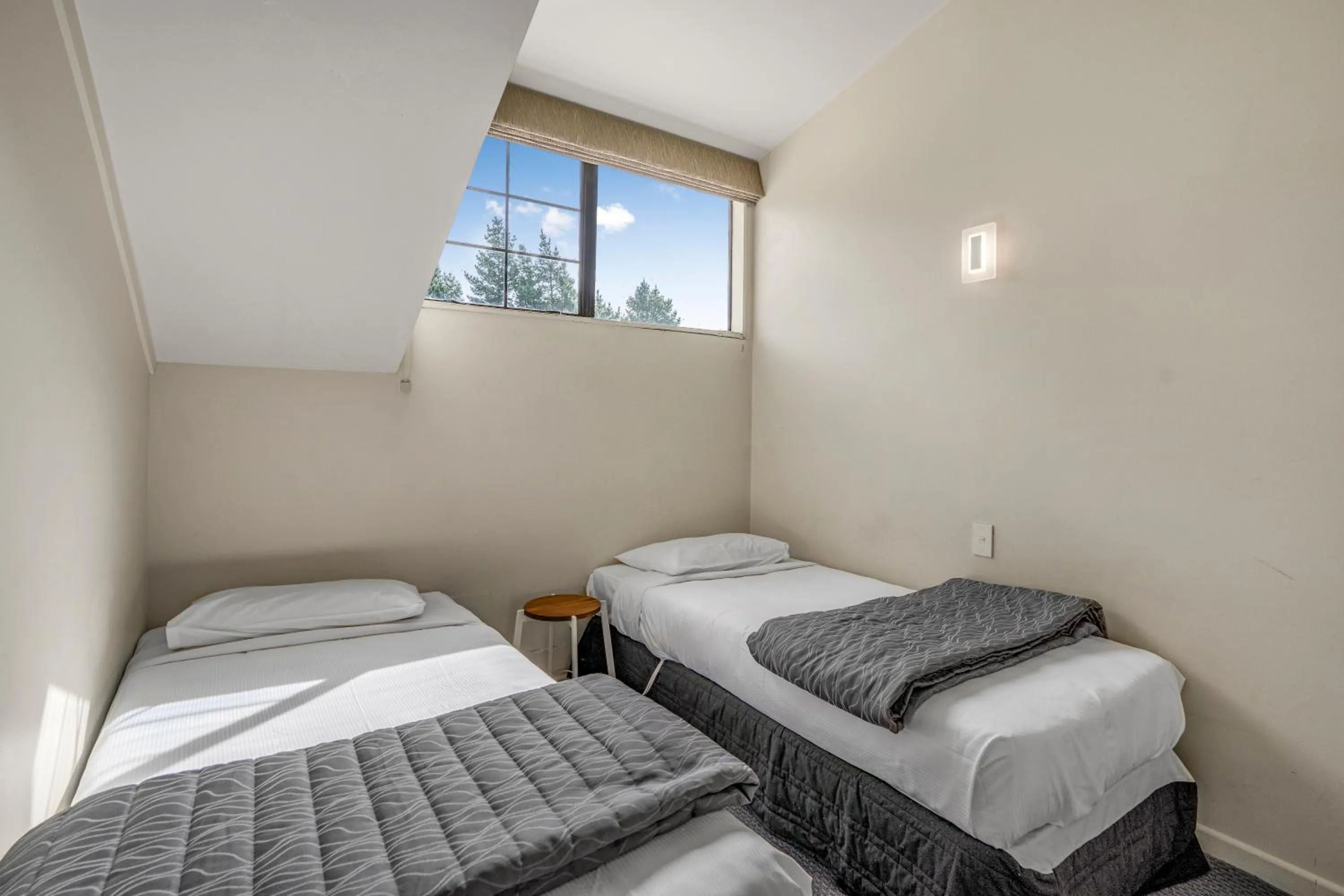 Bed in Capital Lodge Motor Inn