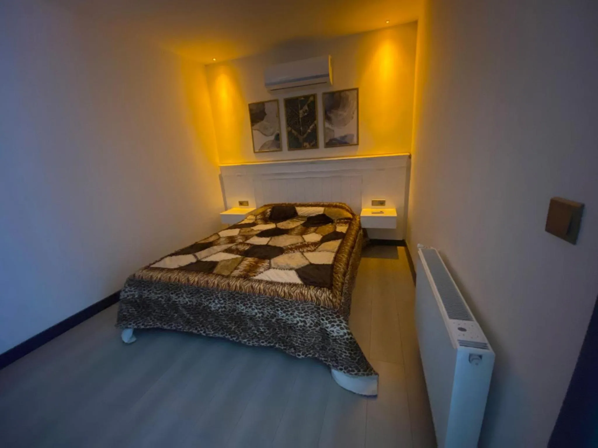 Bed in ELUXİO SUİTE HOTEL