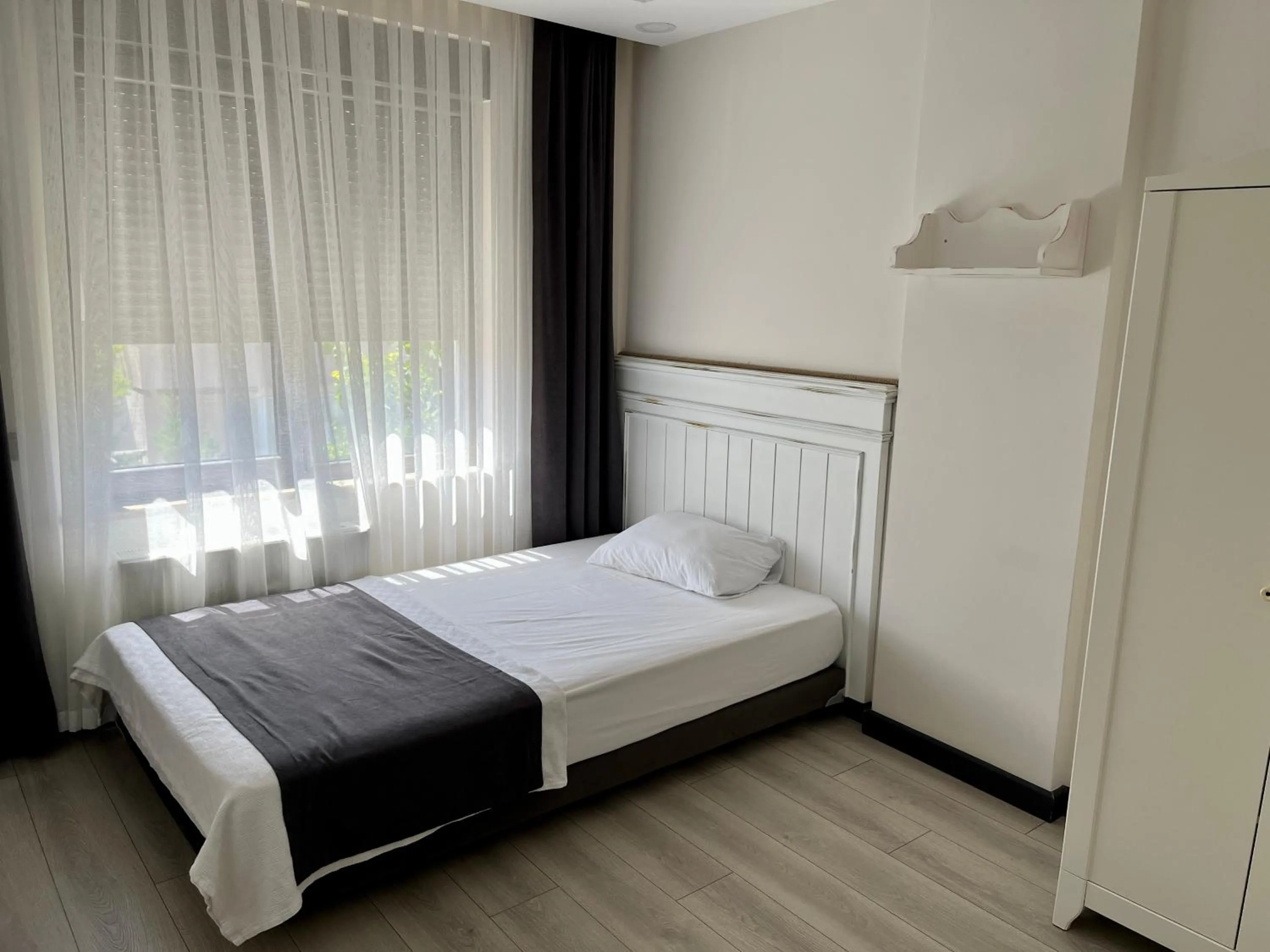 Bedroom in ELUXİO SUİTE HOTEL